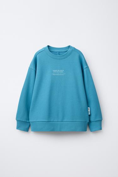 PLAIN SWEATSHIRT WITH EMBOSSED SLOGAN - Light blue by Zara - Image 0