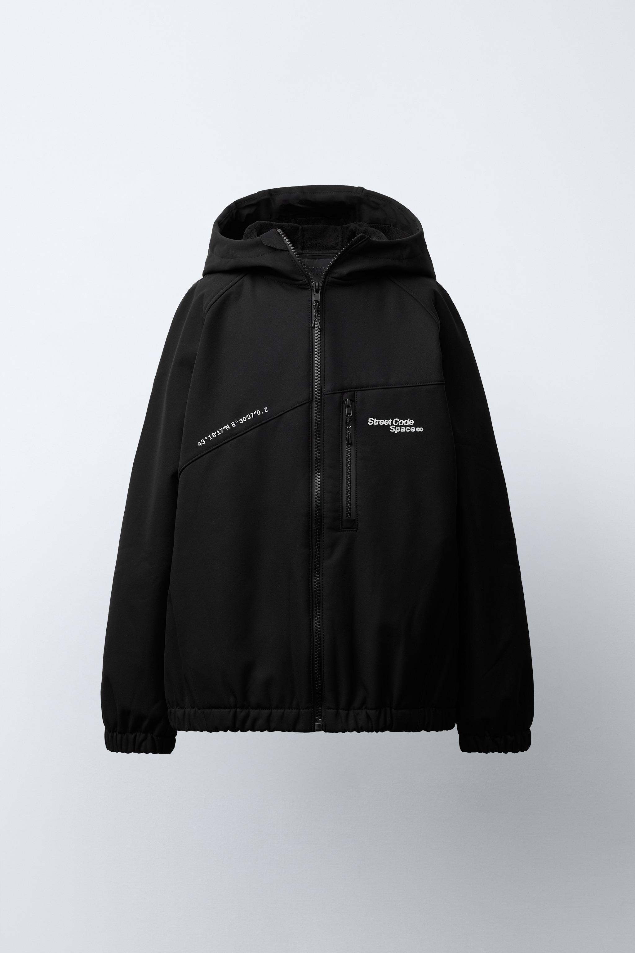 BLOUSON TECHNIQUE À CAPUCHE DÉPERLANT