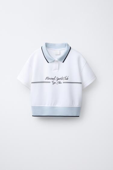 POLO PIQUÉ CON MODAL - Blanco roto de Zara