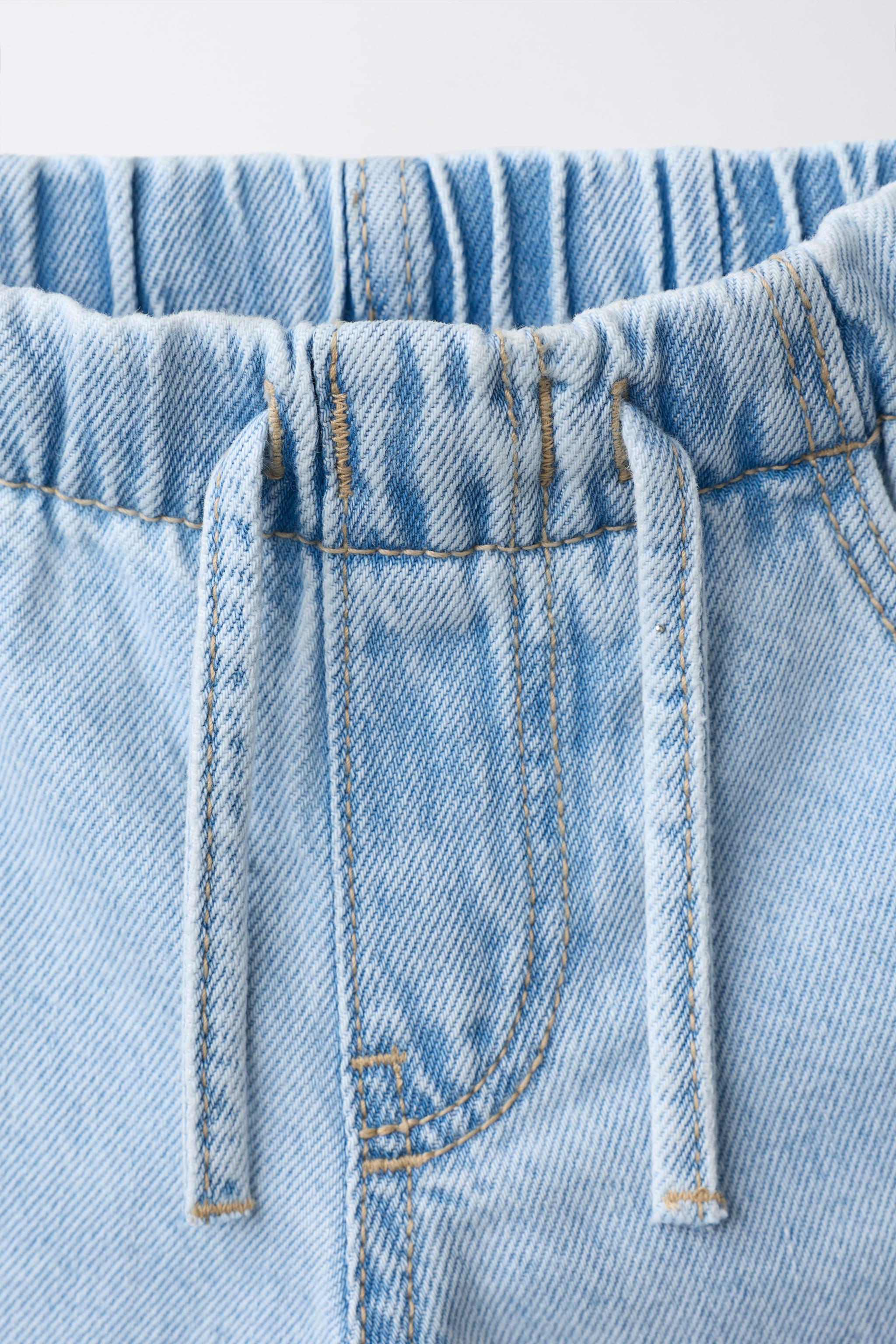 JEAN WIDE LEG À DÉCHIRURES