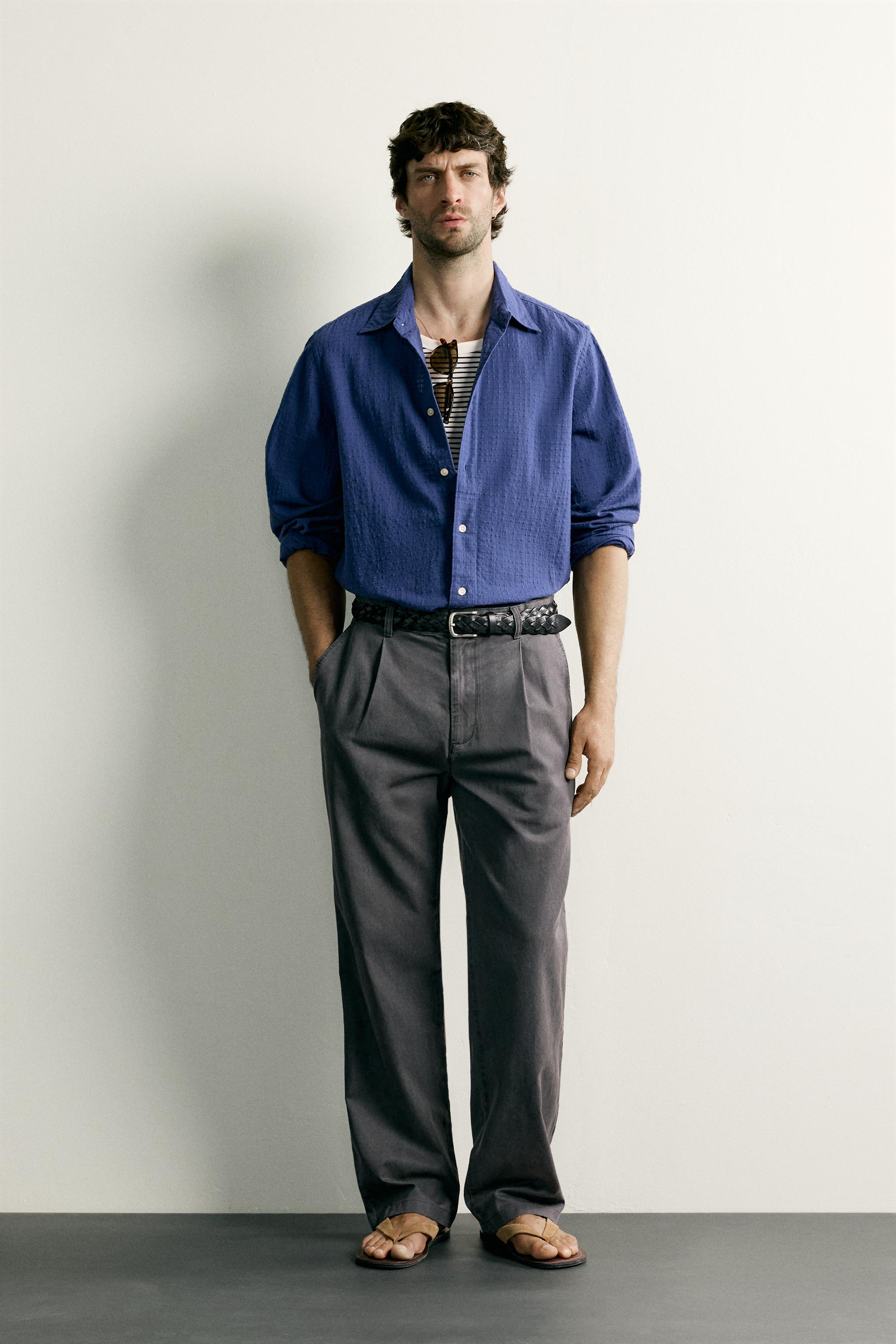 RELAXED FIT PLEATED CHINO PANTS
