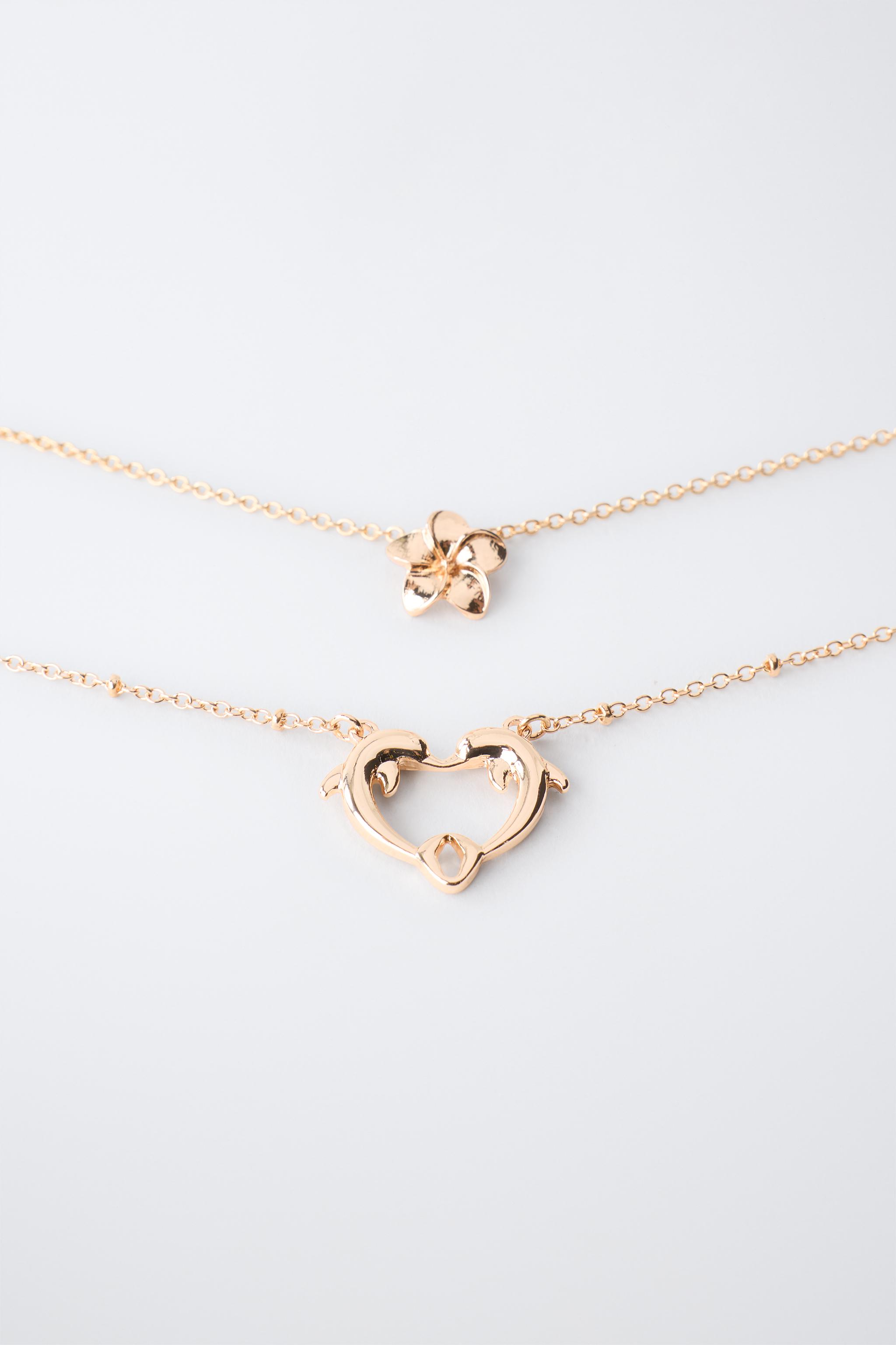 TWO-PACK OF DOLPHIN AND HIBISCUS PENDANT NECKLACES — Golden (alternate view)