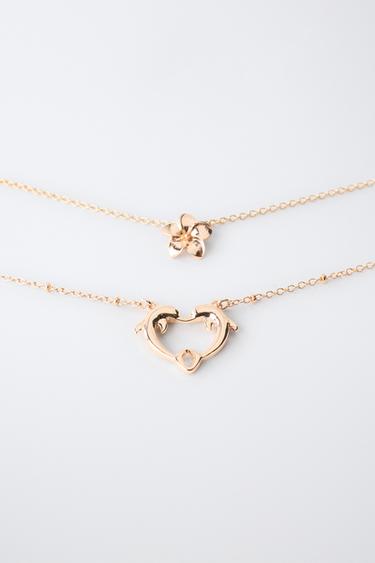 PACK DOS COLLARES COLGANTE DELFÍN E HIBISCUS - Dorado de Zara