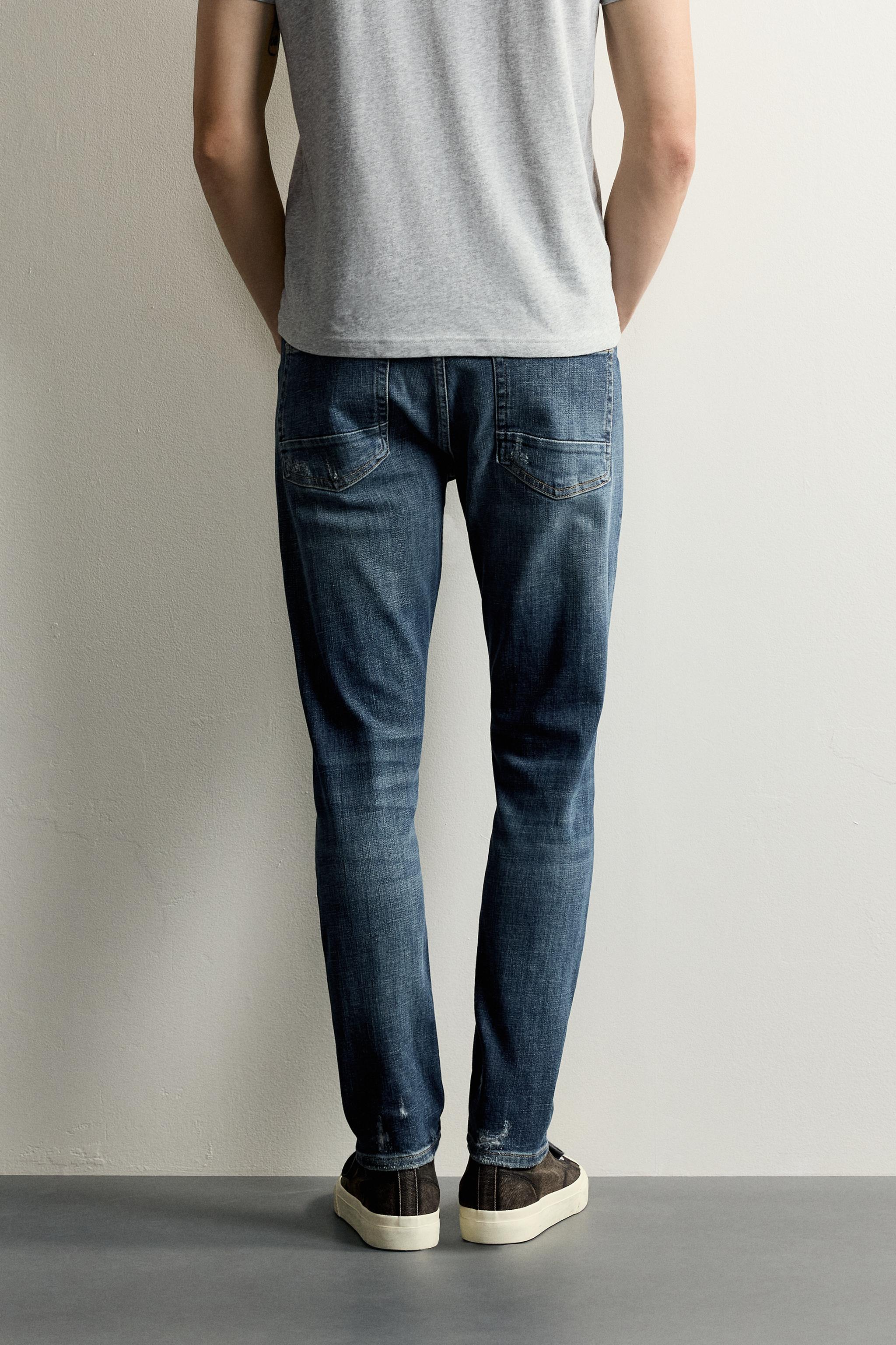 DISTRESSED SKINNY FIT JEANS