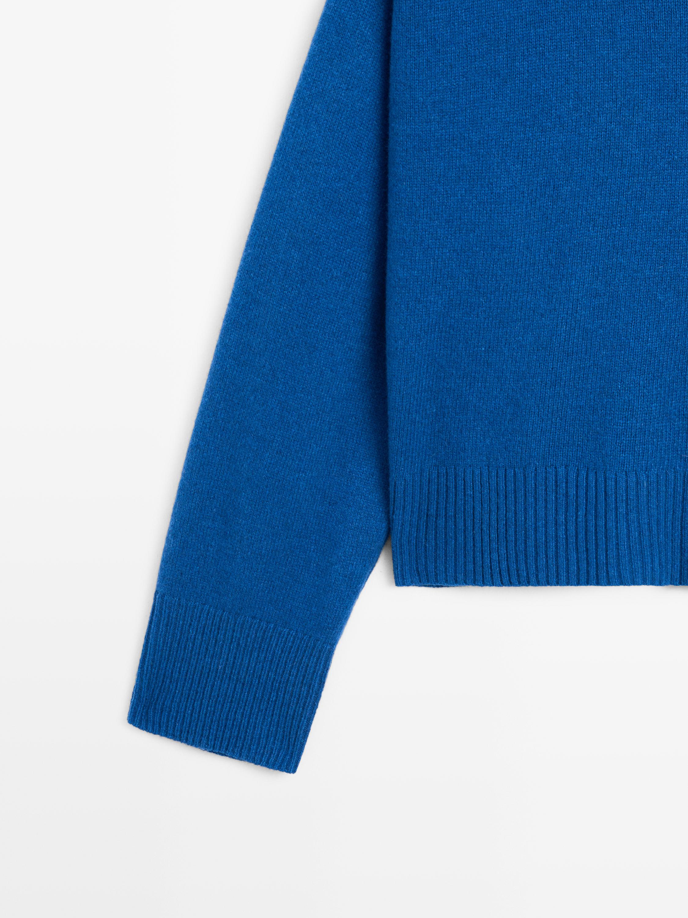 Wool blend knit sweater with high neck