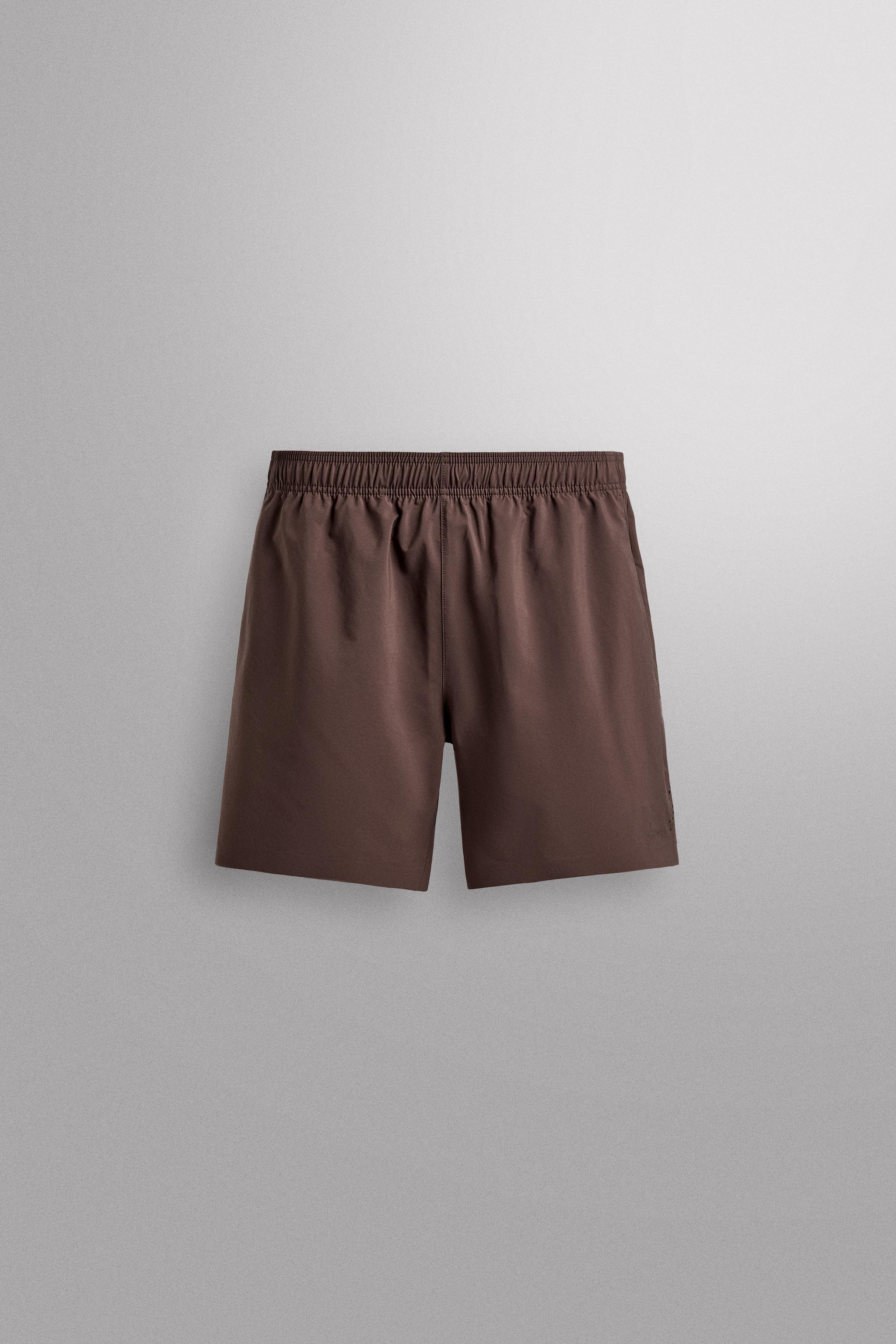 9" TRAINING SHORTS — Brown