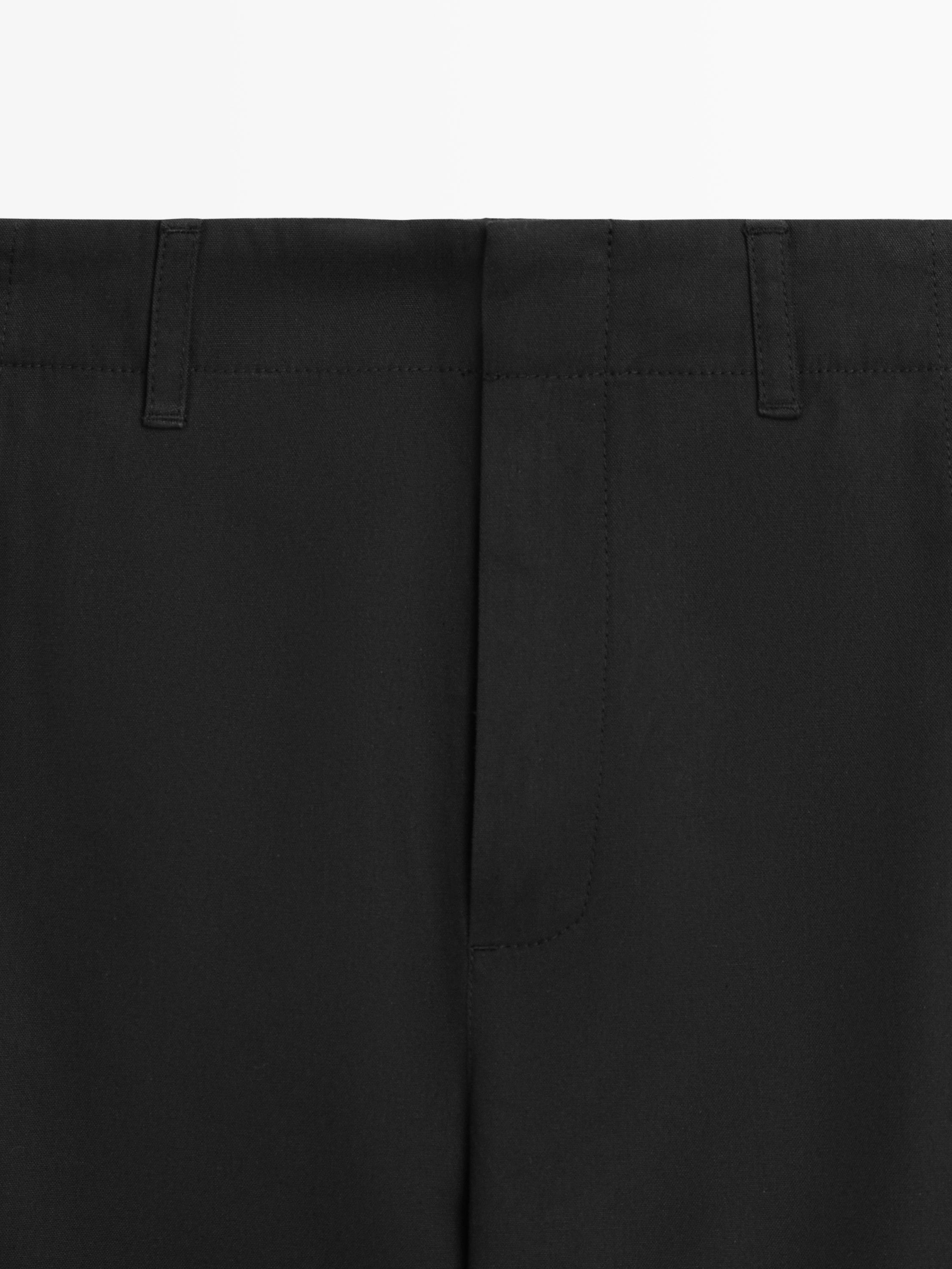 Cotton blend trousers with hem detail