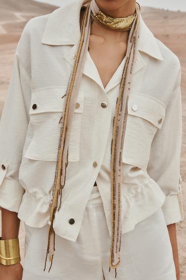 CHEMISE SAFARI COURTE MANCHE RETROUSSÉE - Beige clair de Zara - Image 1