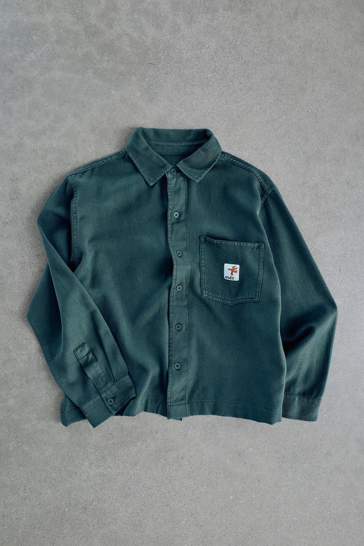 Sobrecamisa bolsillo etiqueta