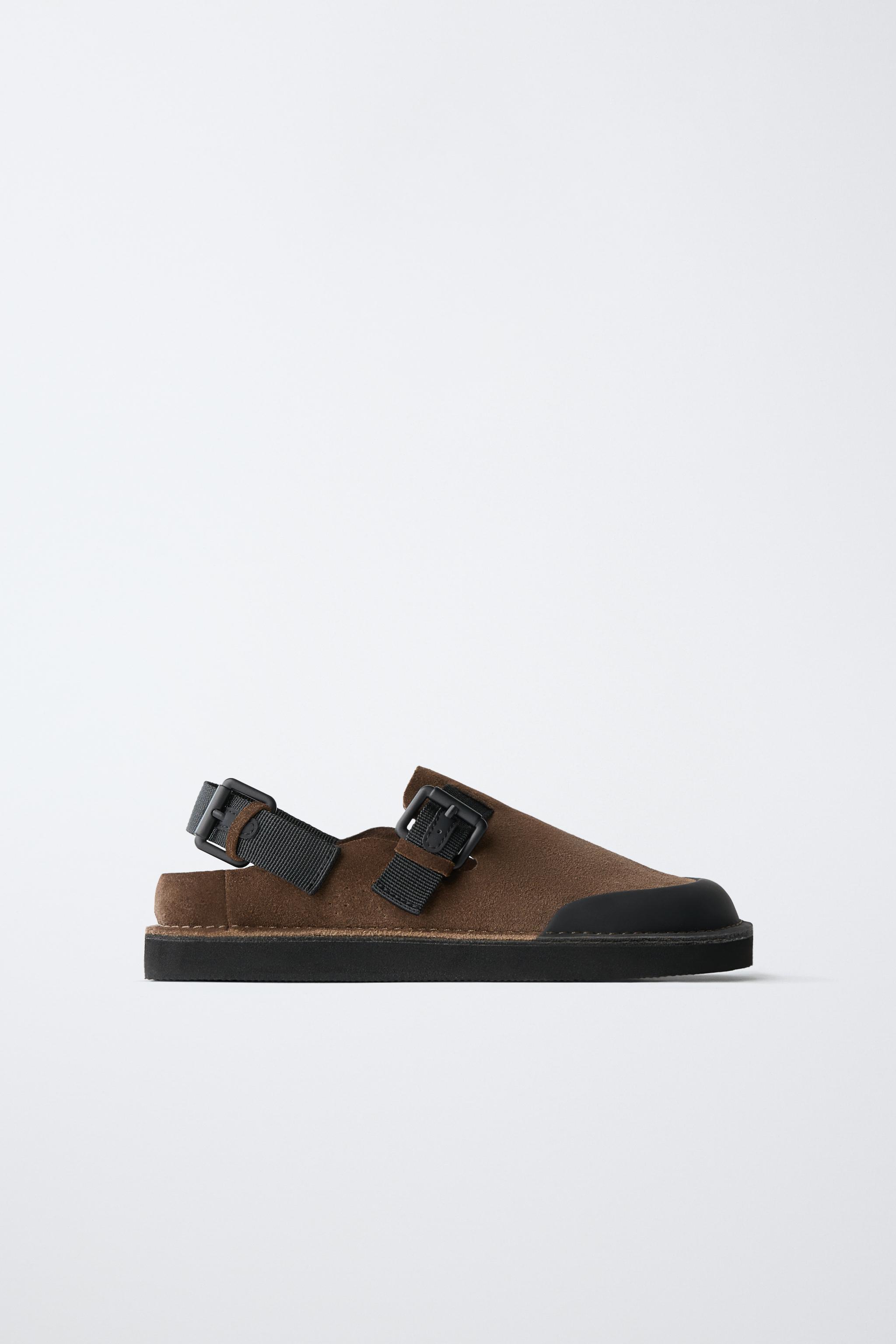 BUCKLED CLOGS