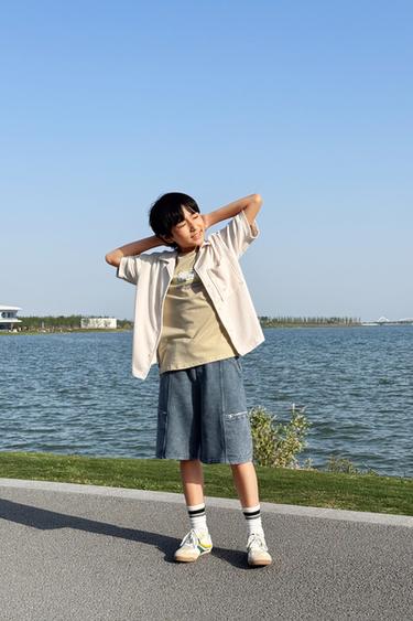 BERMUDA EFECTO LAVADO BOLSILLOS CREMALLERAS - Azul lavado de Zara