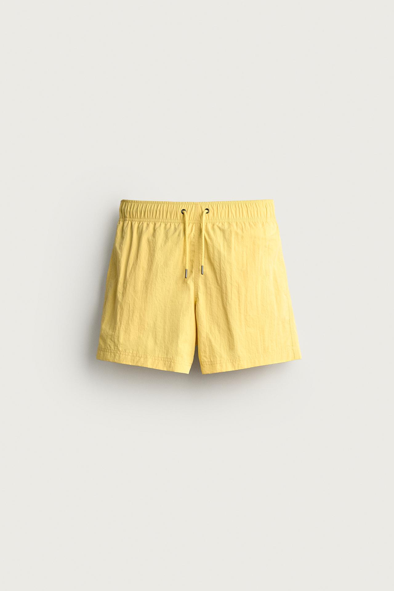 TEXTURED MID-LENGTH SWIM SHORTS — Yellow