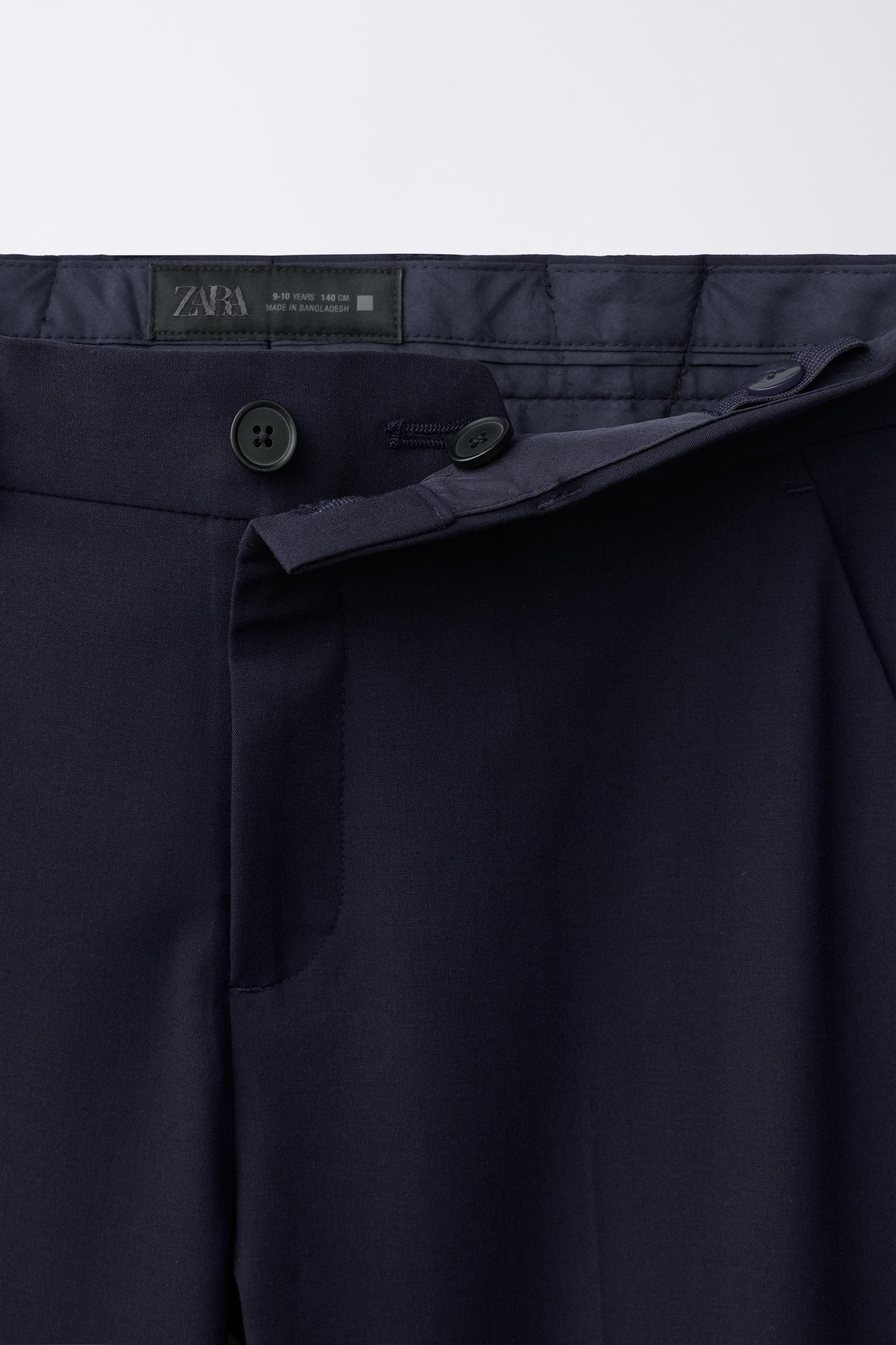 TEXTURED SOLID SUIT PANTS