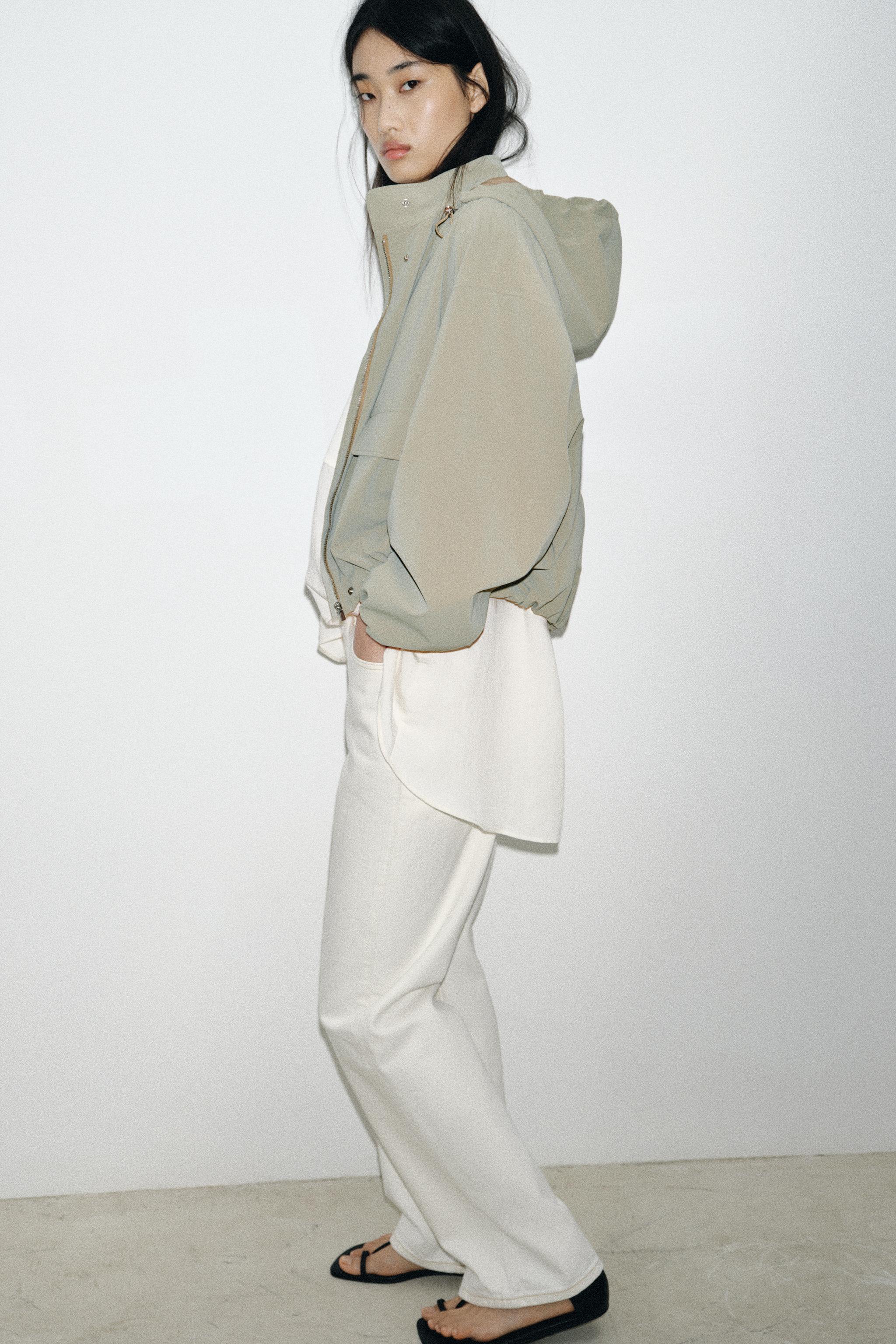 BLOUSON ENGOMMÉ À CAPUCHE