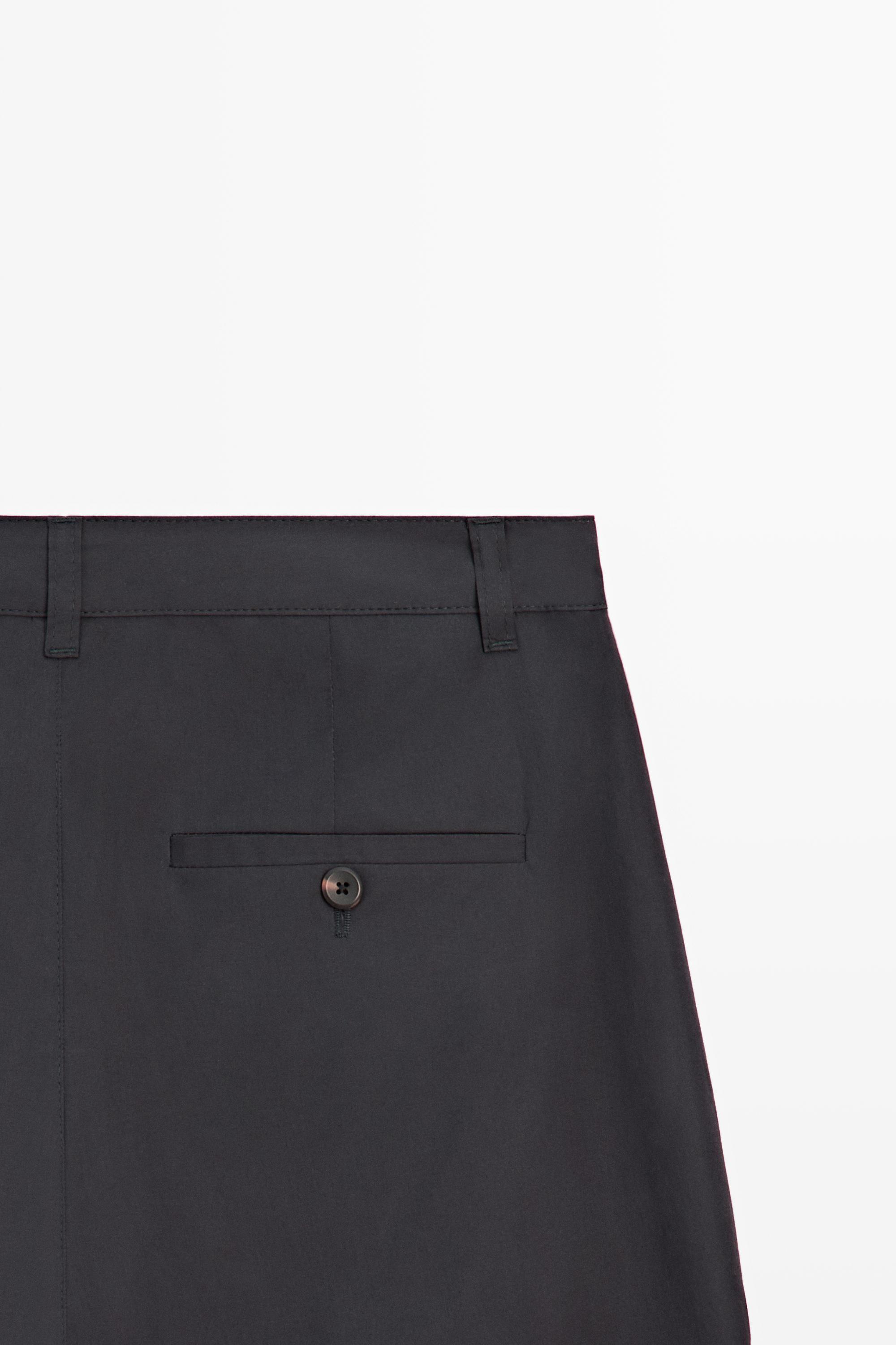 Cotton blend wide-leg pleated trousers