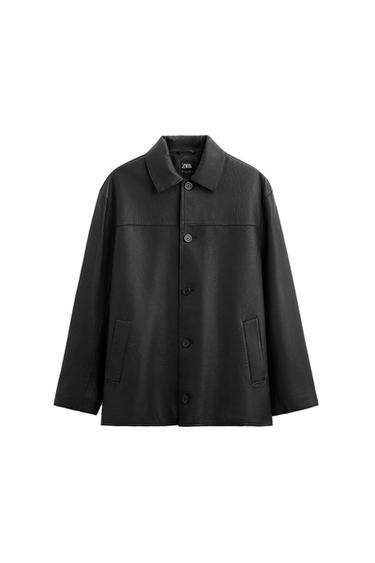 Black synthetic leather jacket with front buttons and side pockets. Visible inside label with "ZARA".