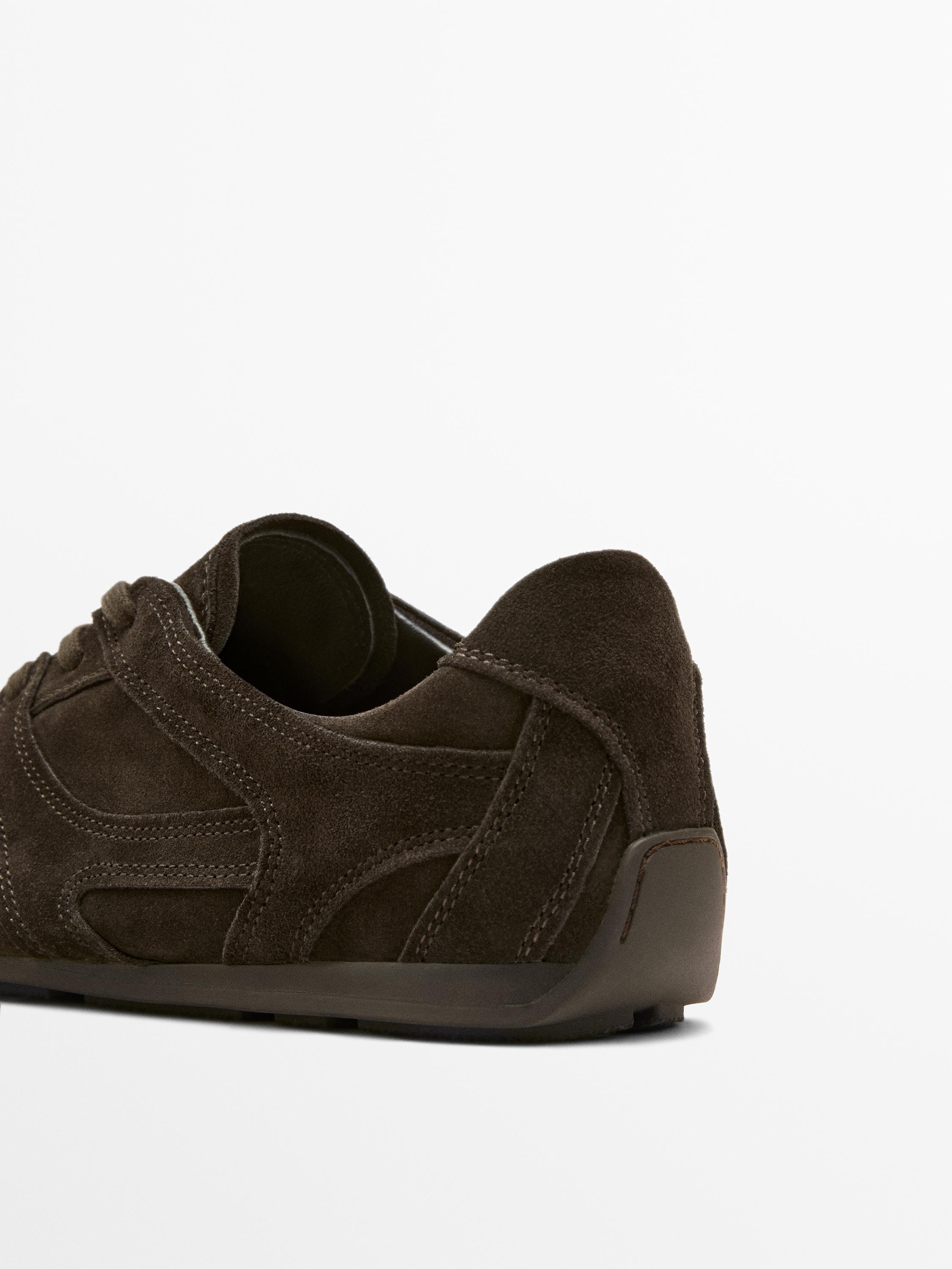 Split leather trainers with piece details