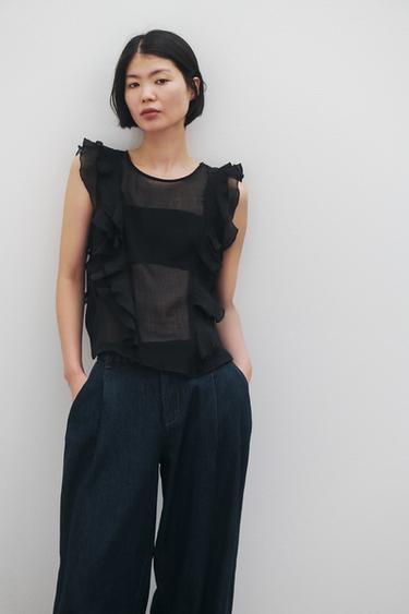 フリル セミシースルーブラウスブラックZaraのフリル セミシースルーブラウス - ブラック