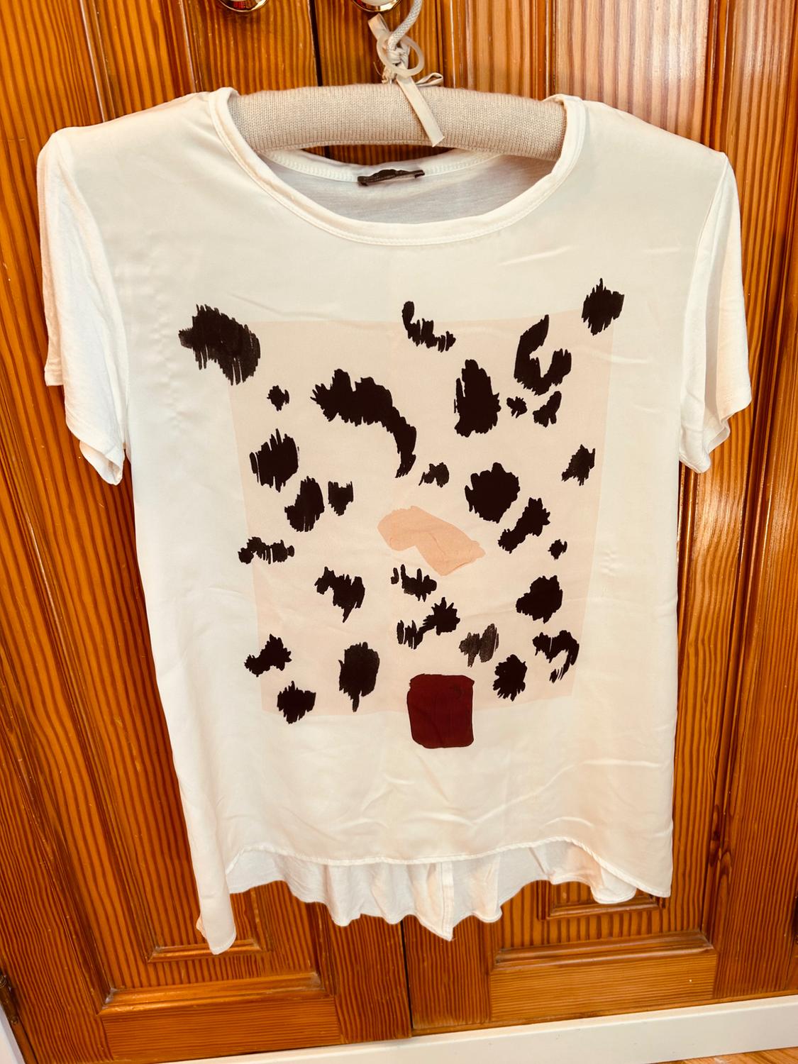Front view of a white t-shirt with an abstract black and brown print.