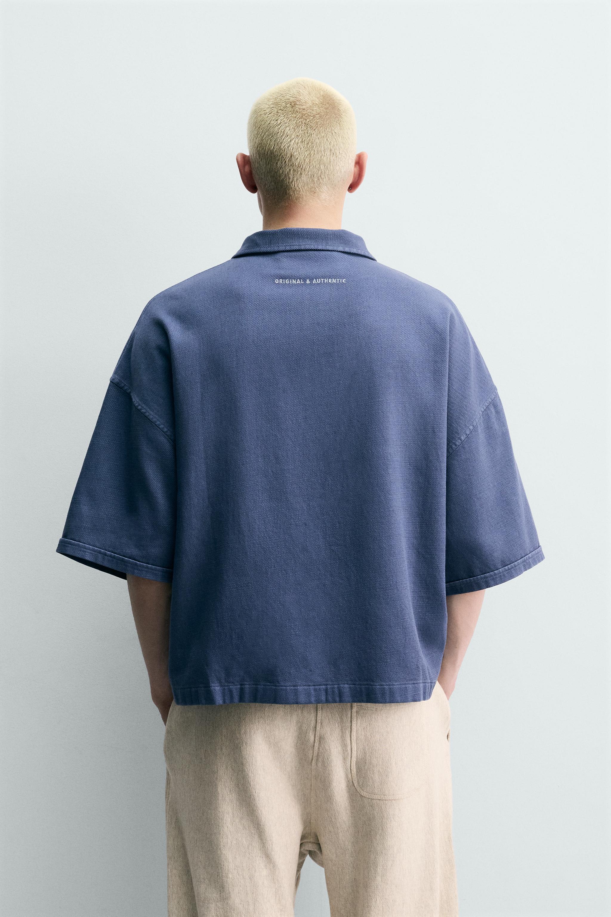 EMBROIDERED TEXT BOXY FIT POLO SHIRT