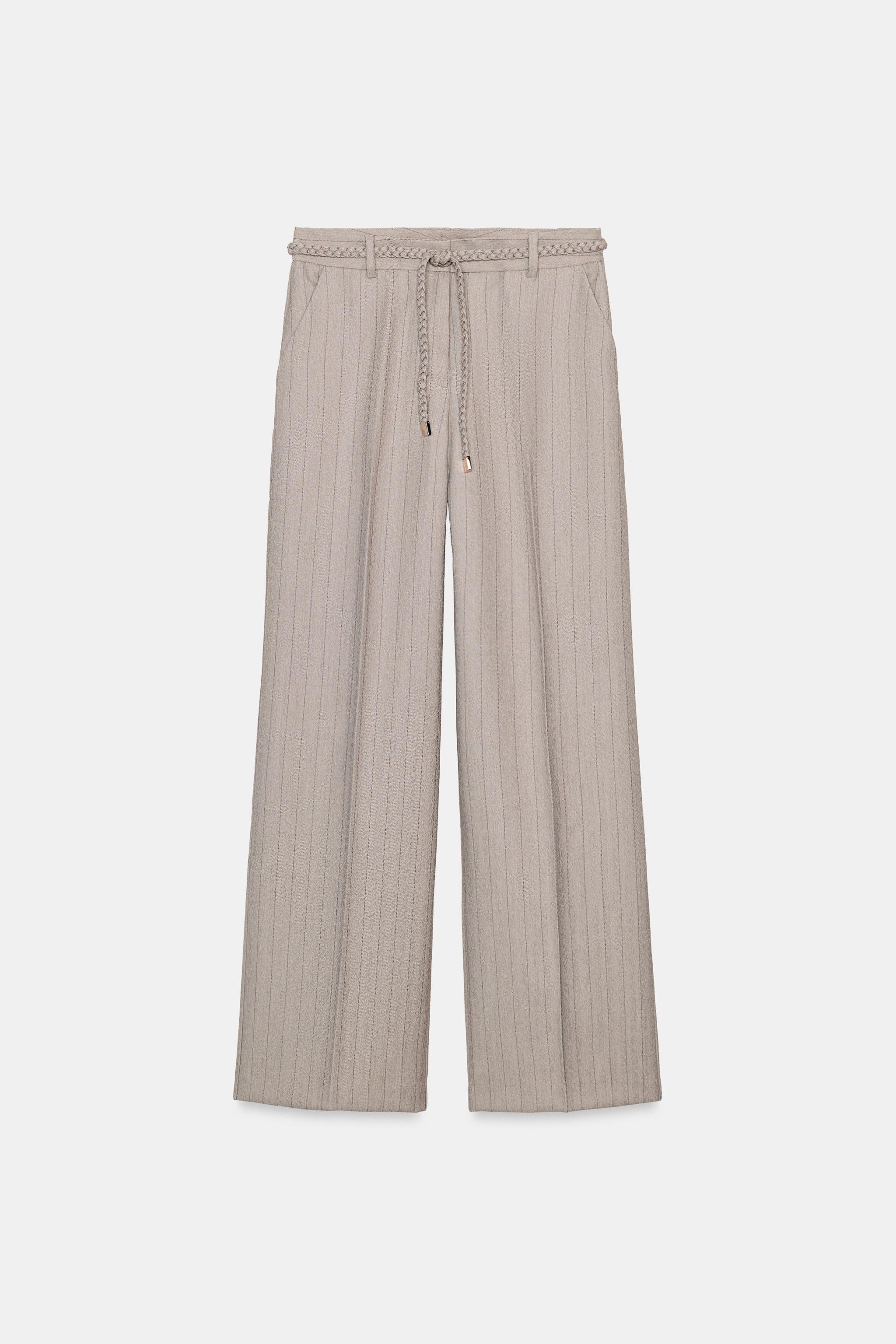 PANTALON CHEVRON AVEC CEINTURE TRESSÉE