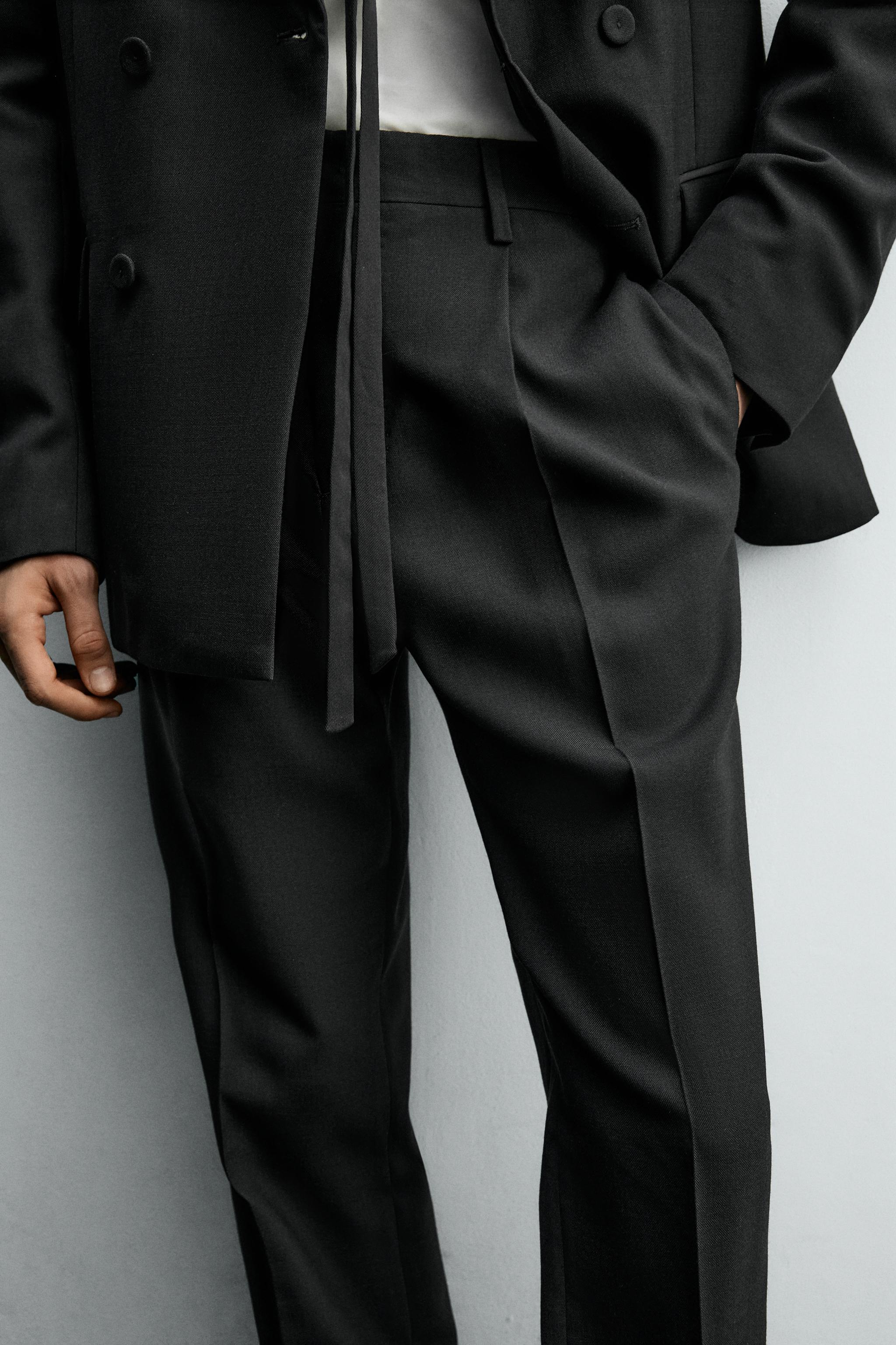 PLEATED SUIT PANTS