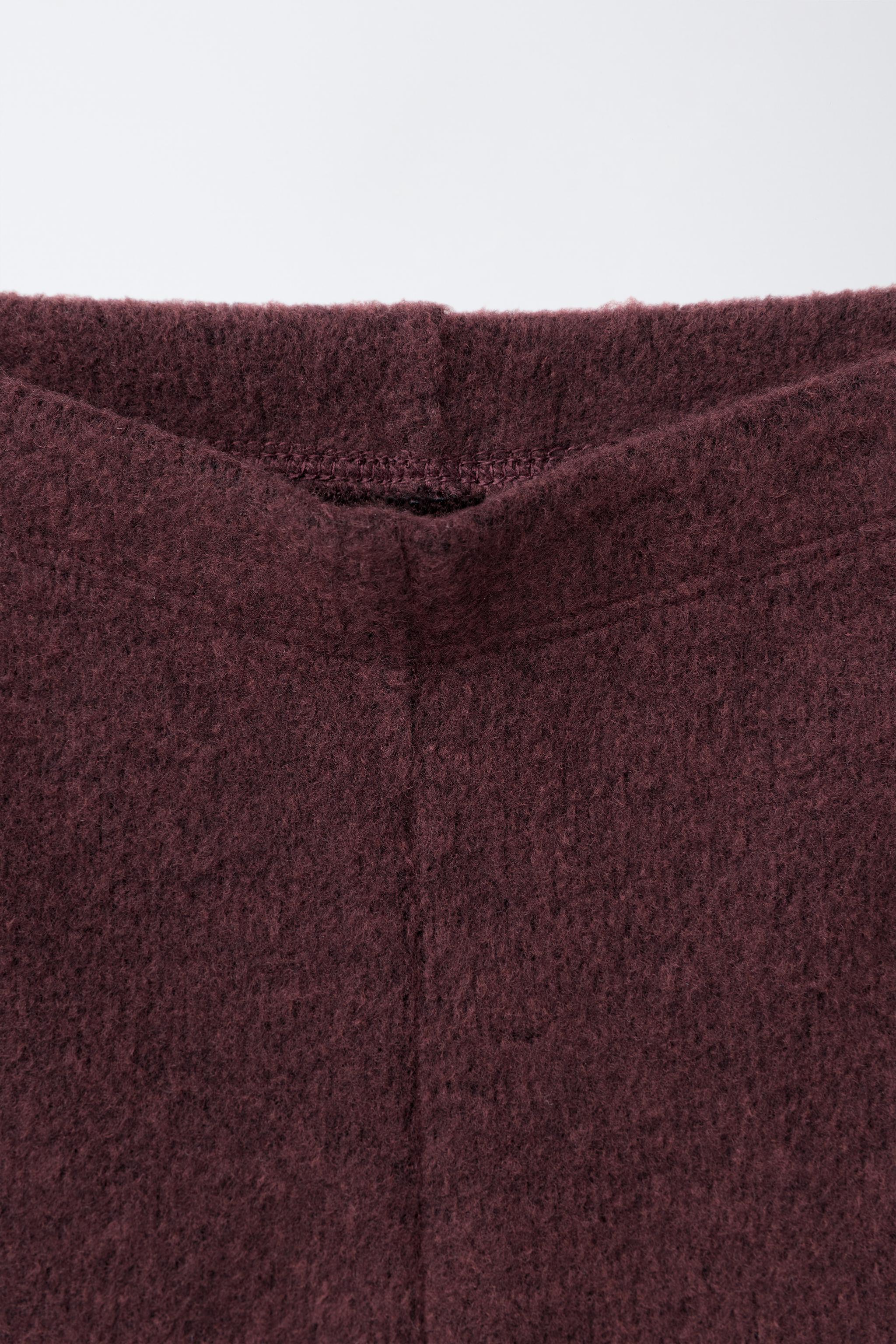 SOFT TOUCH BOW FLARE KNIT PANTS