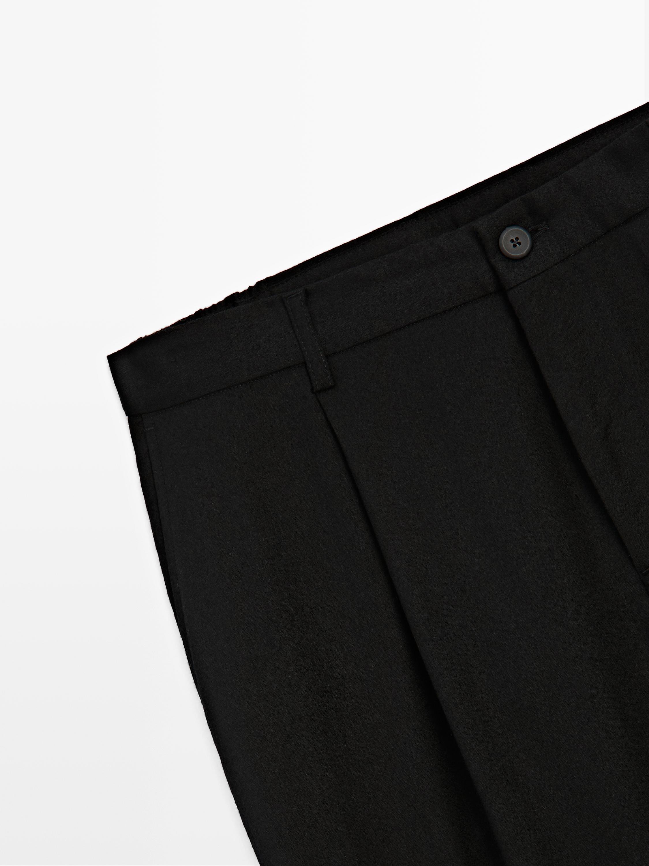 Relaxed fit wool blend darted trousers