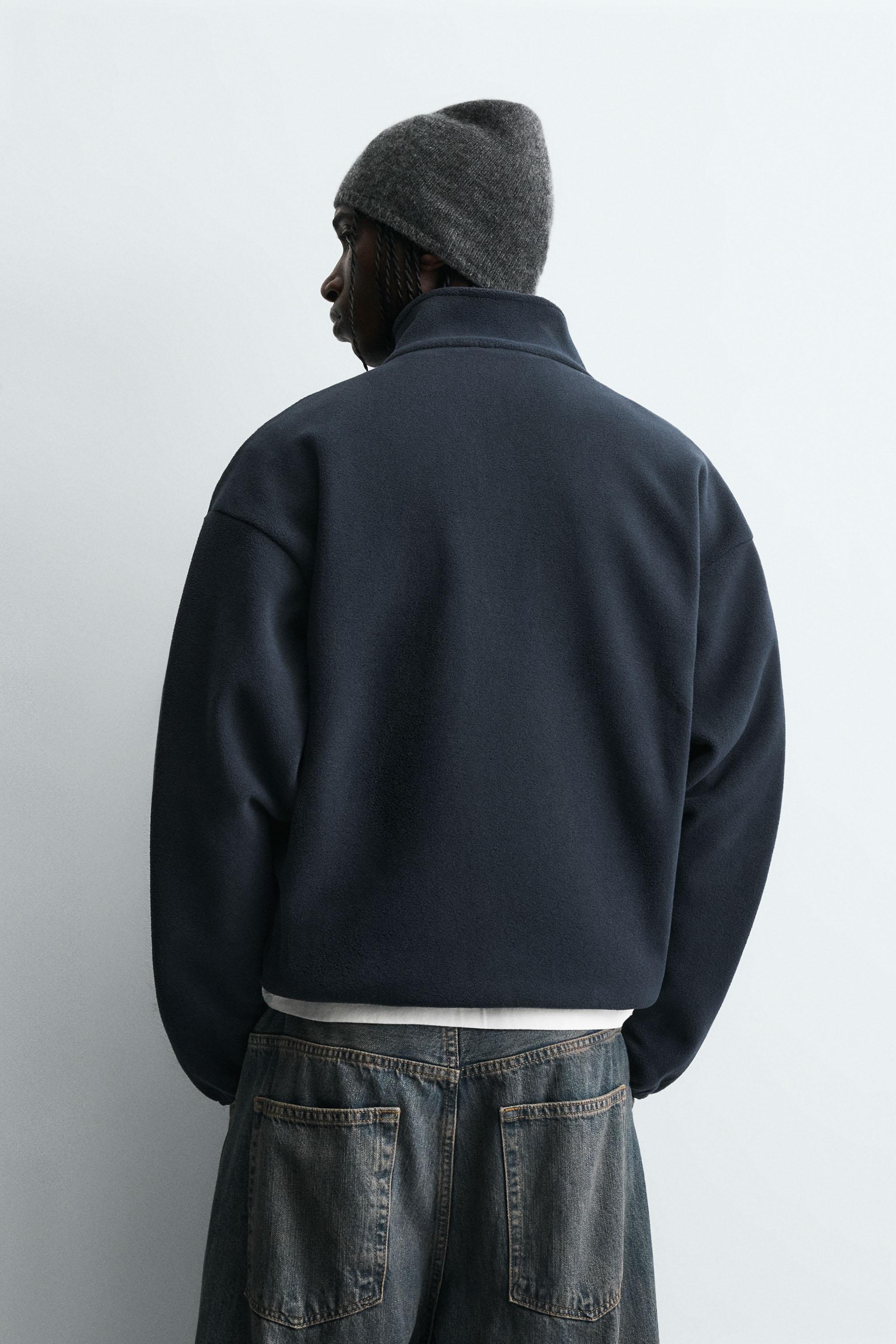 EMBROIDERED QUARTER-ZIP FLEECE SWEATSHIRT