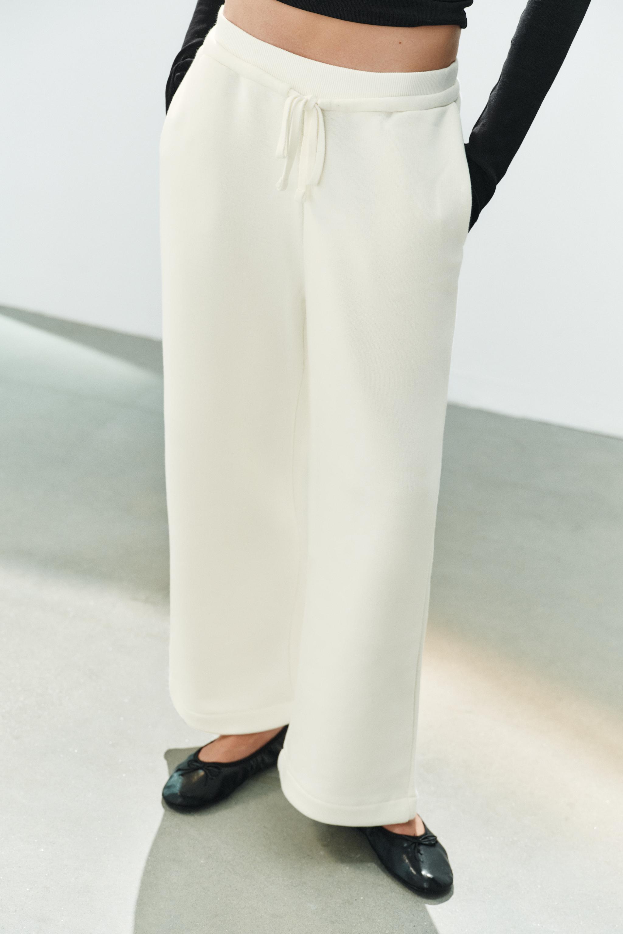 PANTALON EN MOLLETON À CORDONS