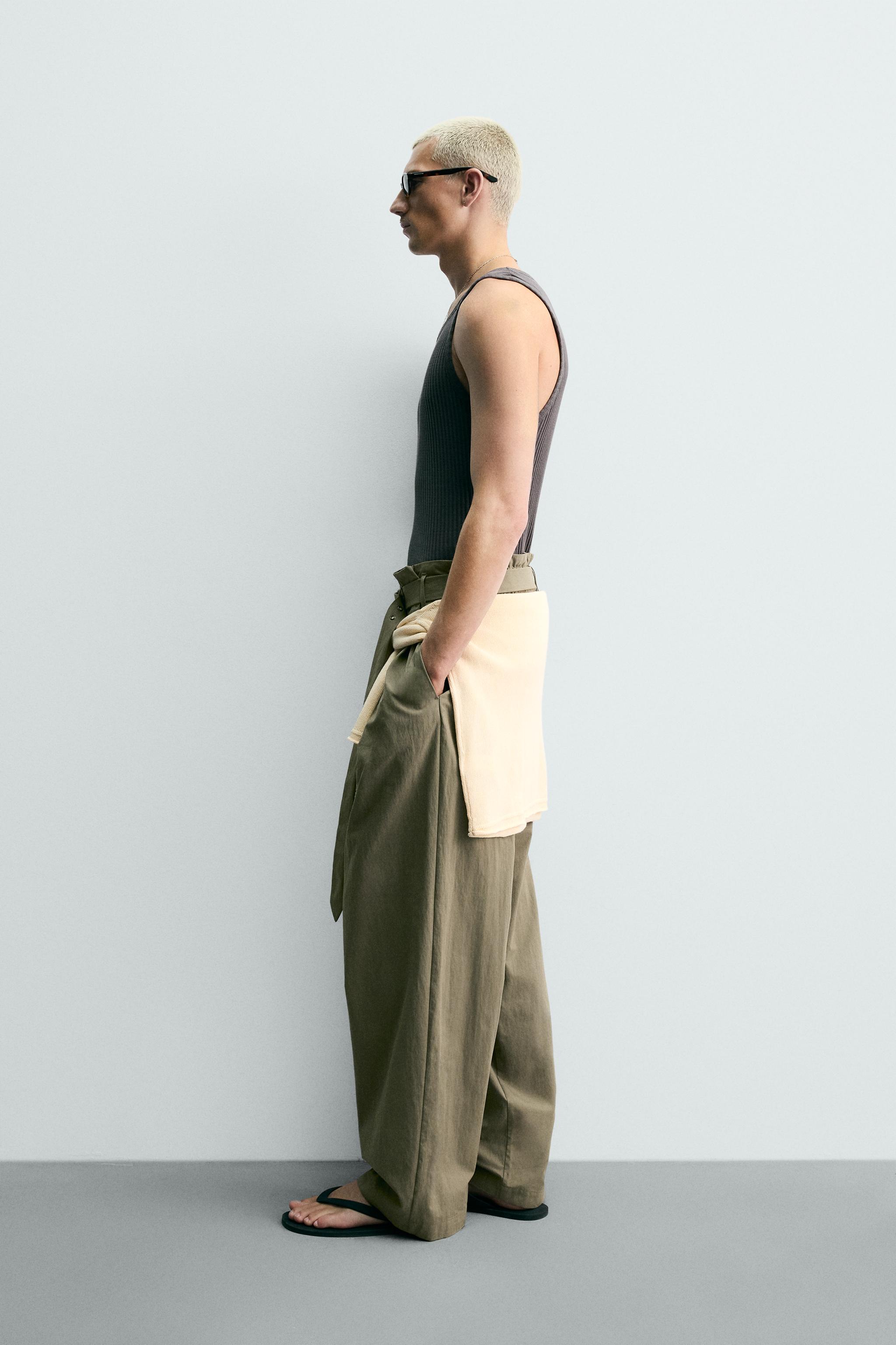 BELTED PLEATED WIDE FIT PANTS