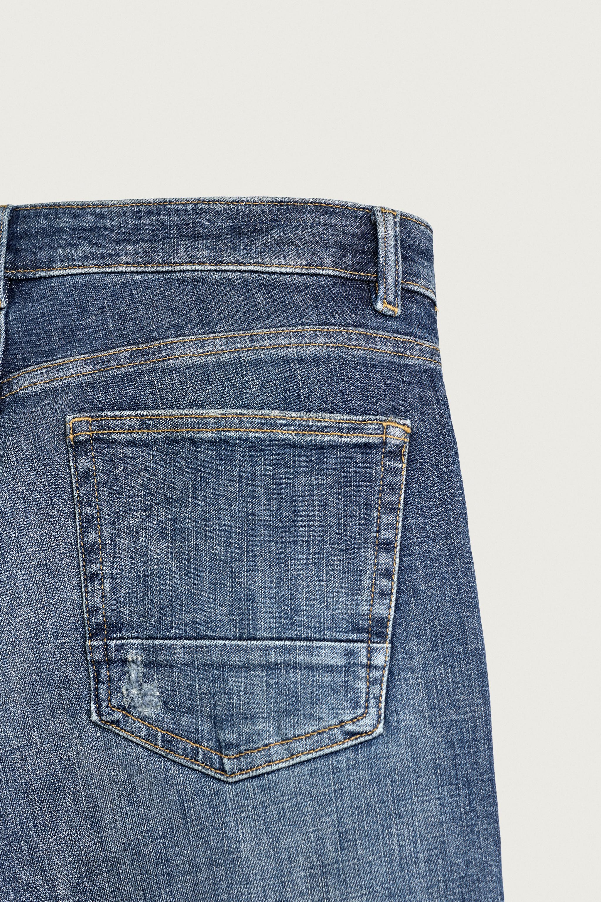 DISTRESSED SKINNY FIT JEANS