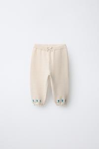 EMBROIDERED FLORAL TEXTURED PANTS WITH LACE TRIM