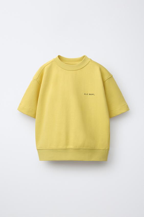 SHORT SLEEVE SWEATSHIRT WITH RAISED SLOGAN - Yellow de Zara - Imagen 0