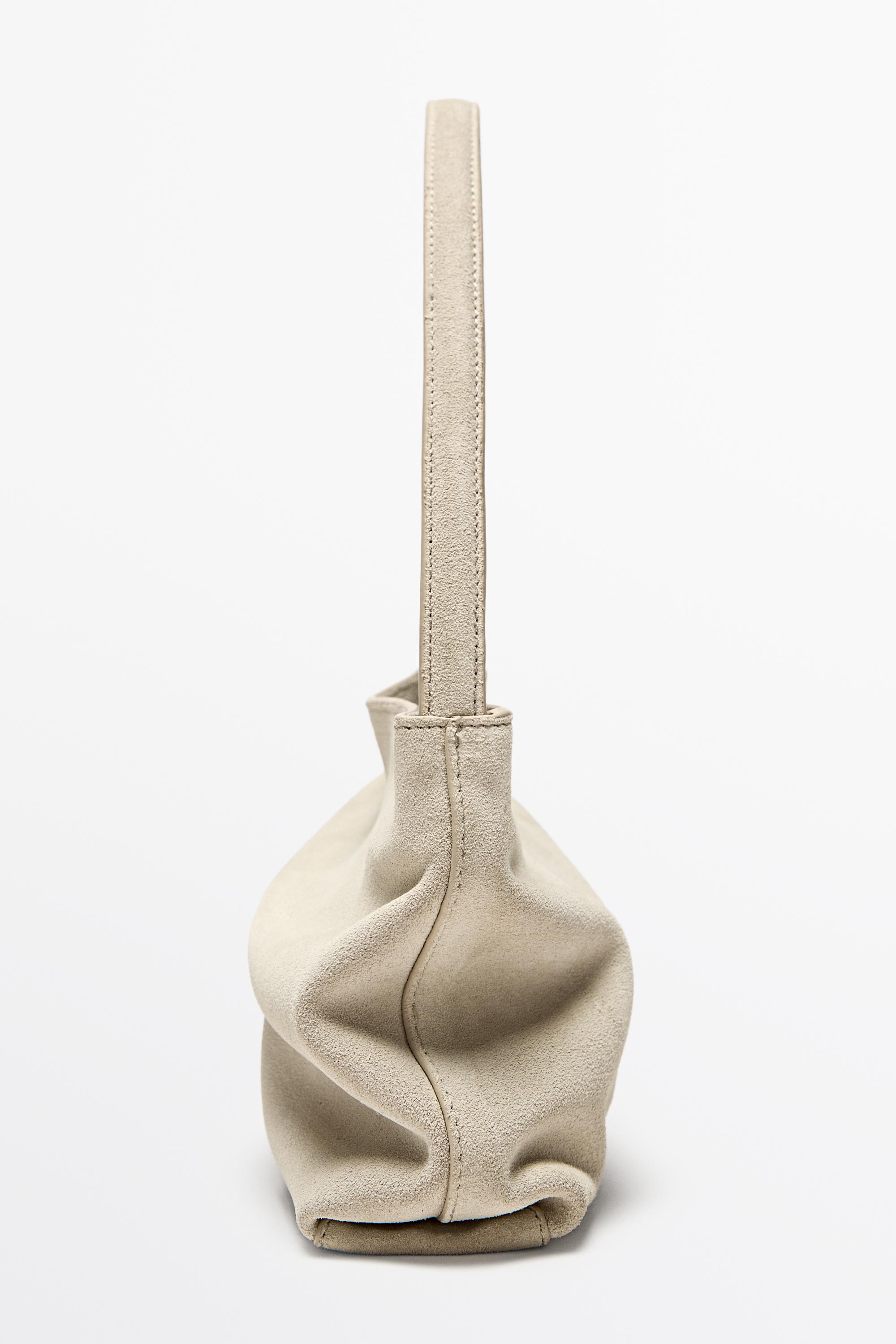 Split suede leather shoulder bag — 299