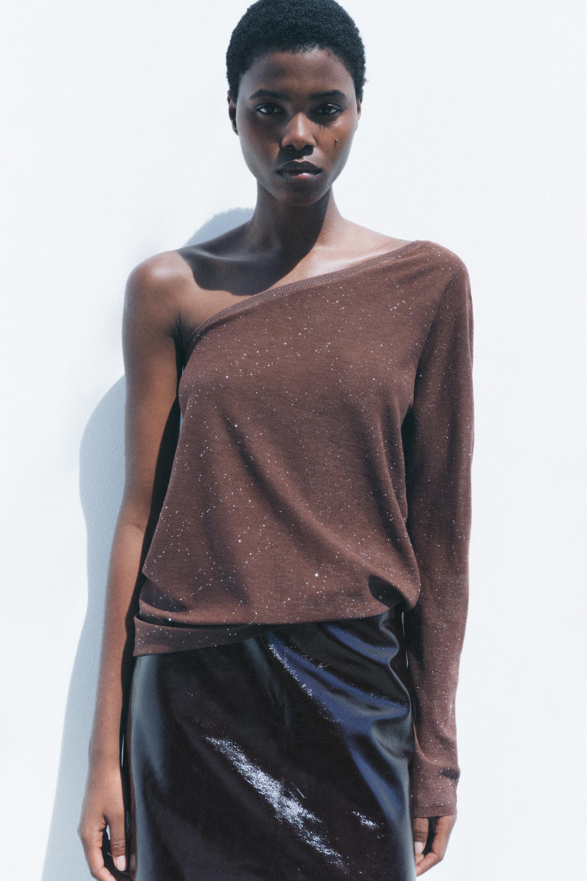 TOP IN MAGLIA ASIMMETRICO CON PAILLETTES