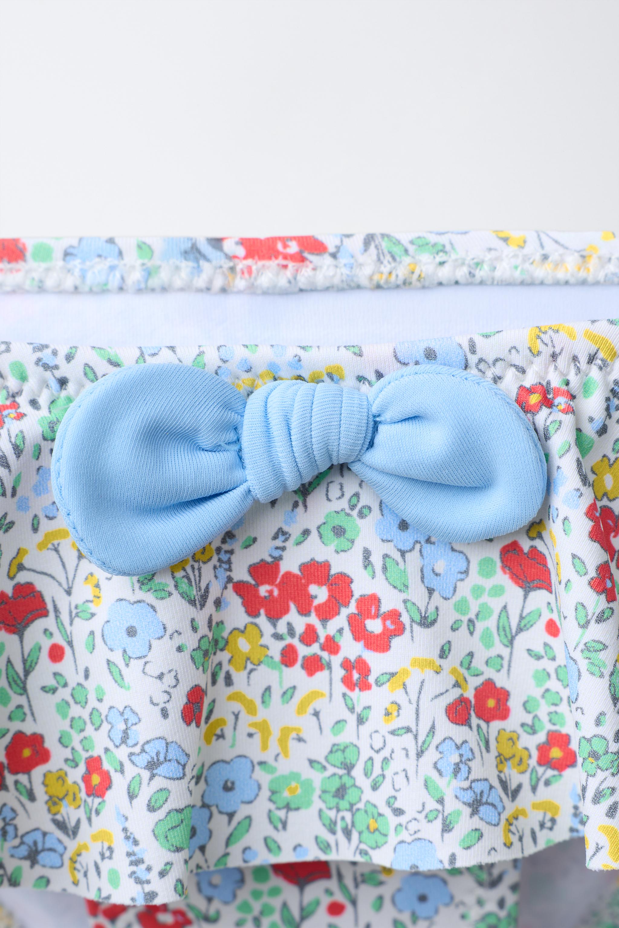 1-6 ANS/ CULOTTE À FLEURS ET VOLANTS