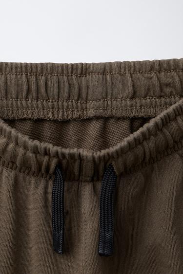 PANTALON SLIM À ZIPS - Marron clair de Zara - Image 2