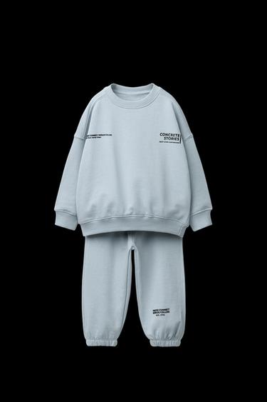 CONJUNTO JOGGING SUDADERA Y PANTALÓN JOGGER TEXTO - Azul claro de Zara - Imagen 0
