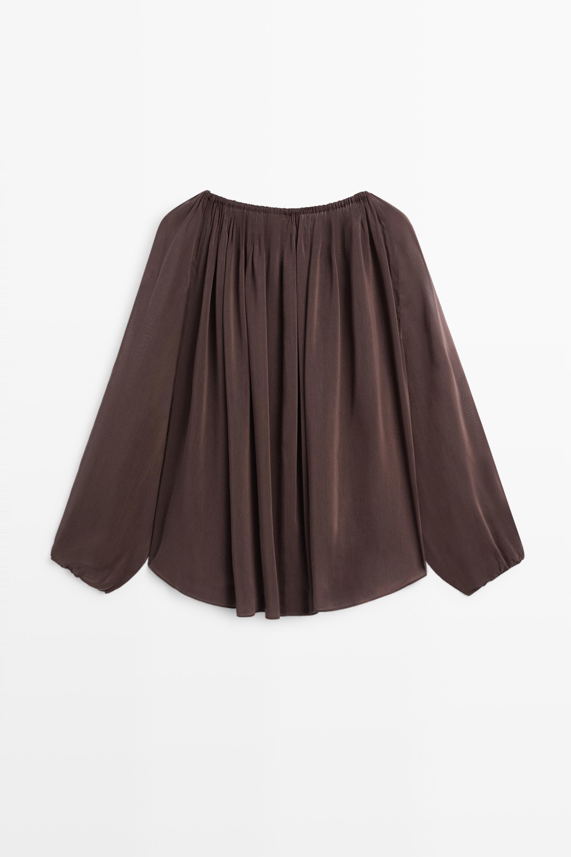 Flowing shirt with gathered details