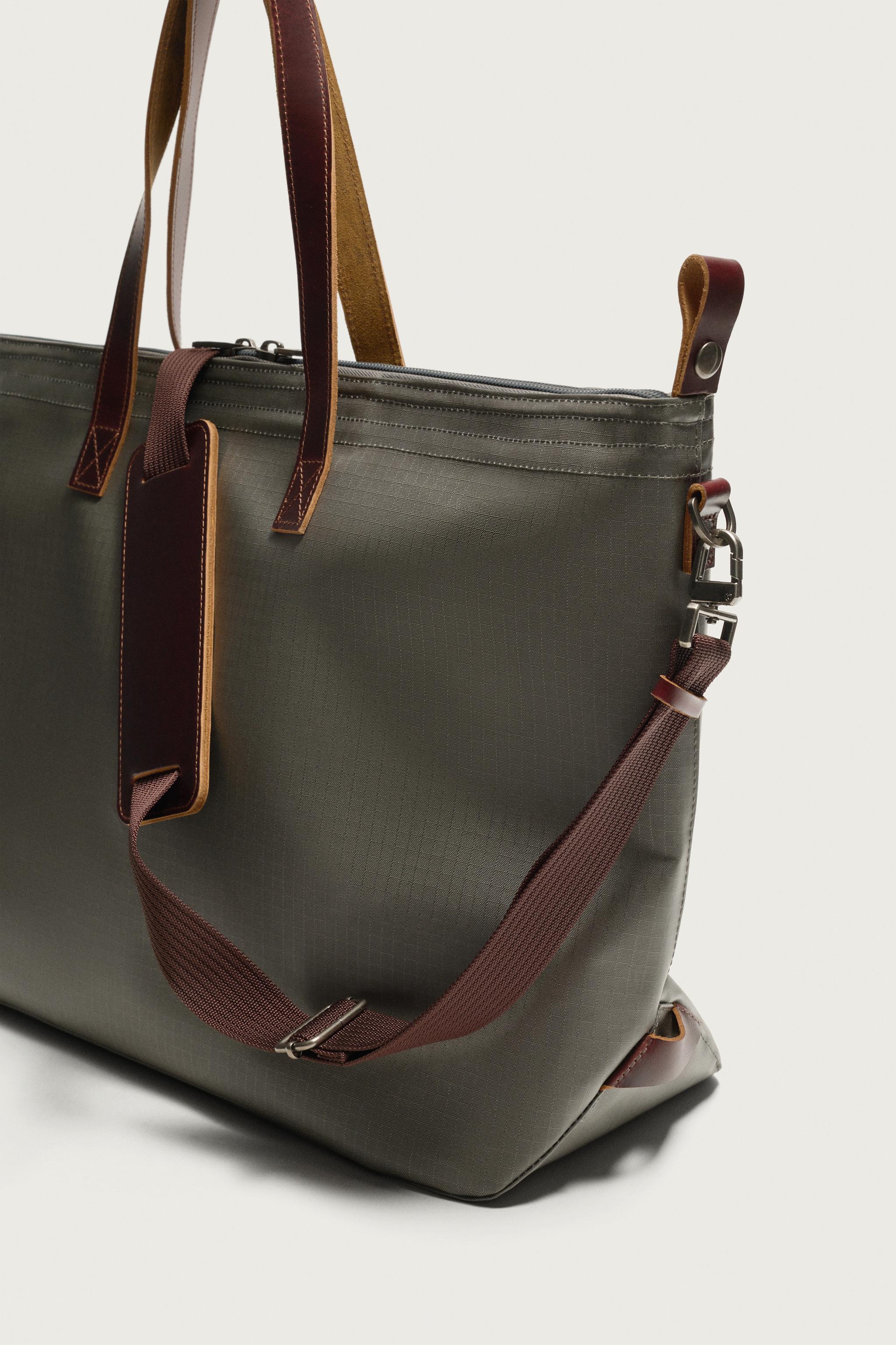 LEATHER-DETAIL TRAVEL BAG