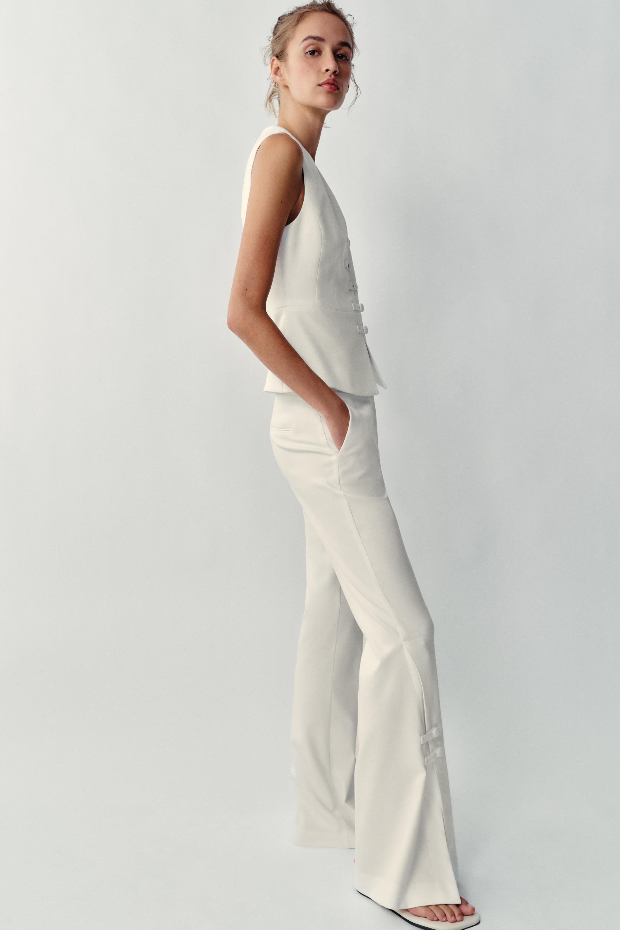 PANTS WITH SLIT HEMS