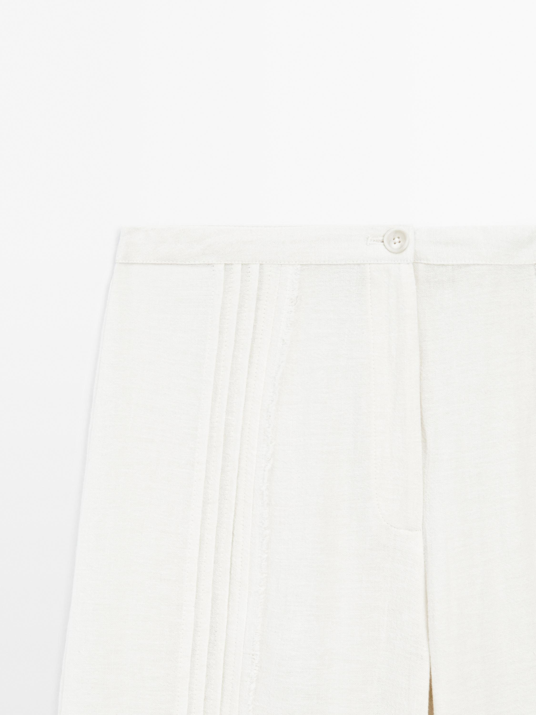 Cotton blend trousers with embroidered details