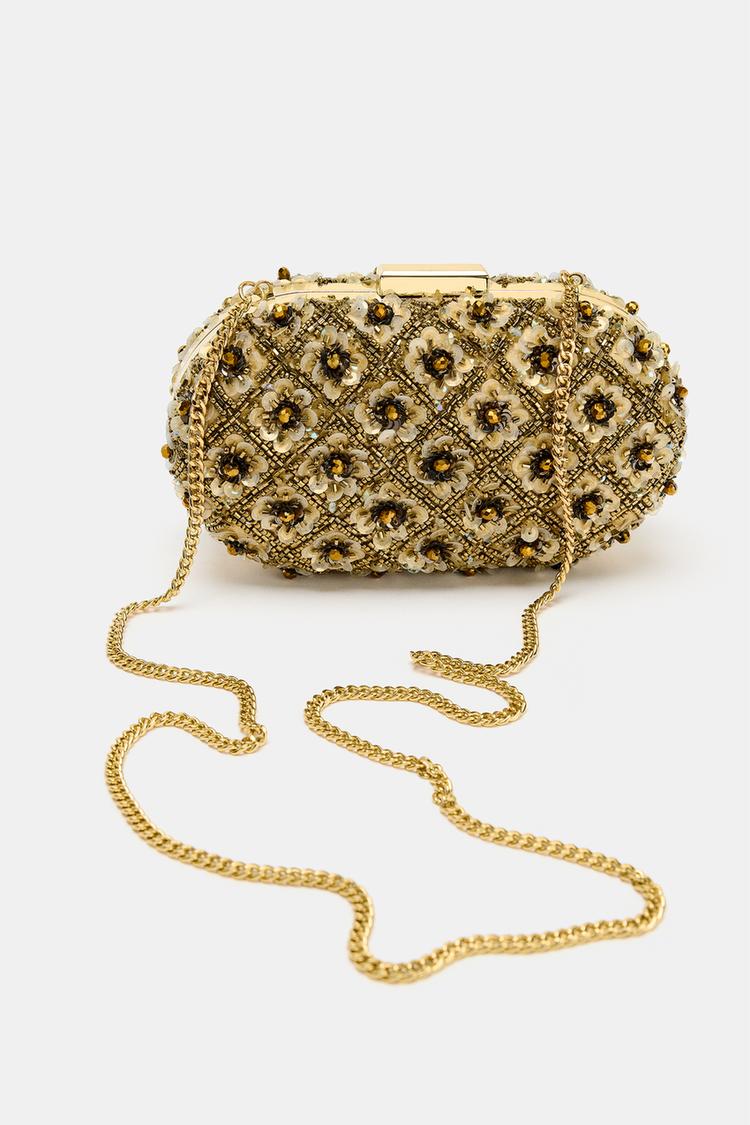 CARTERA DE MANO CON CUENTAS 3