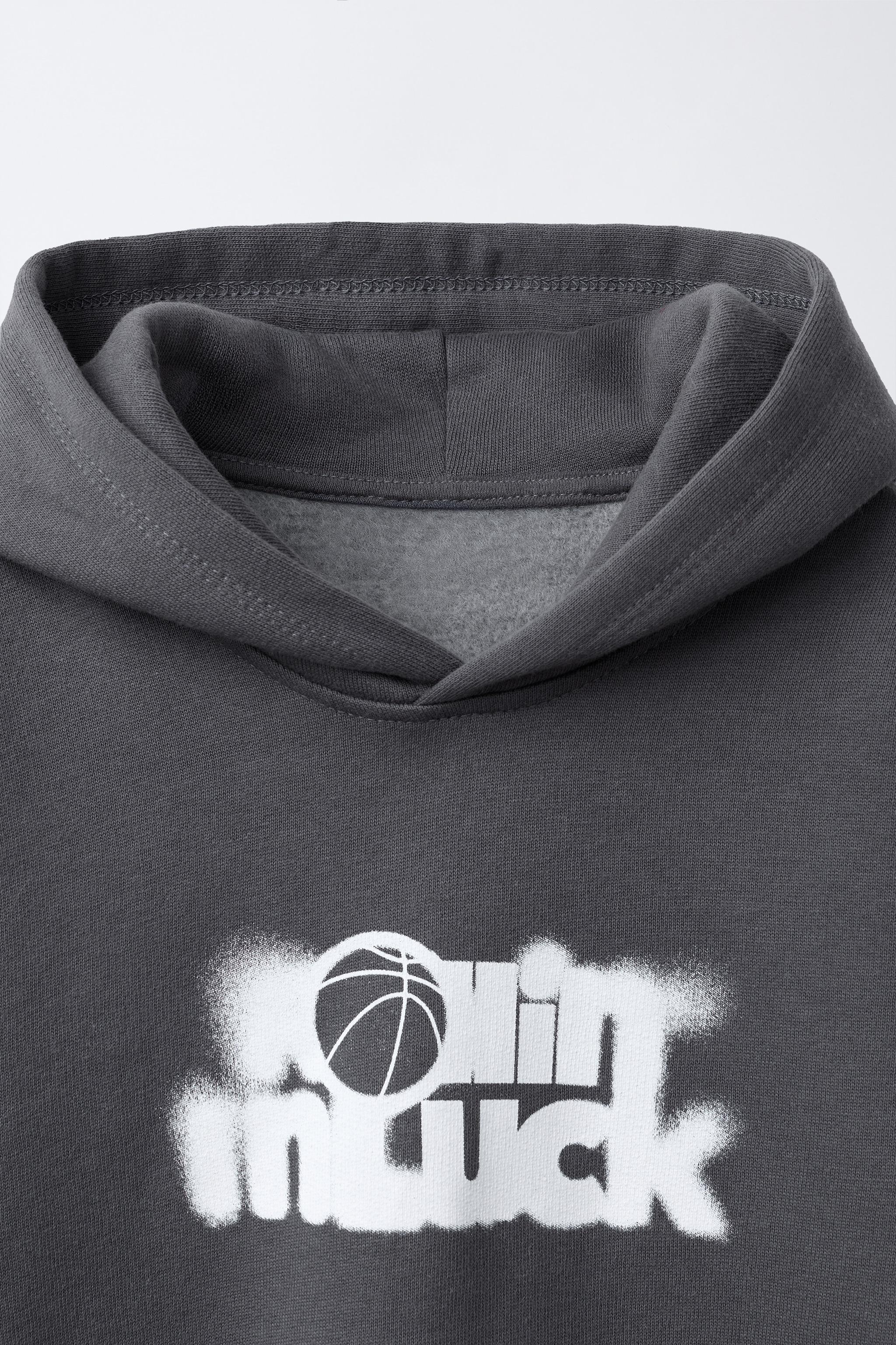 SWEAT À CAPUCHE ET DOUBLE MANCHE