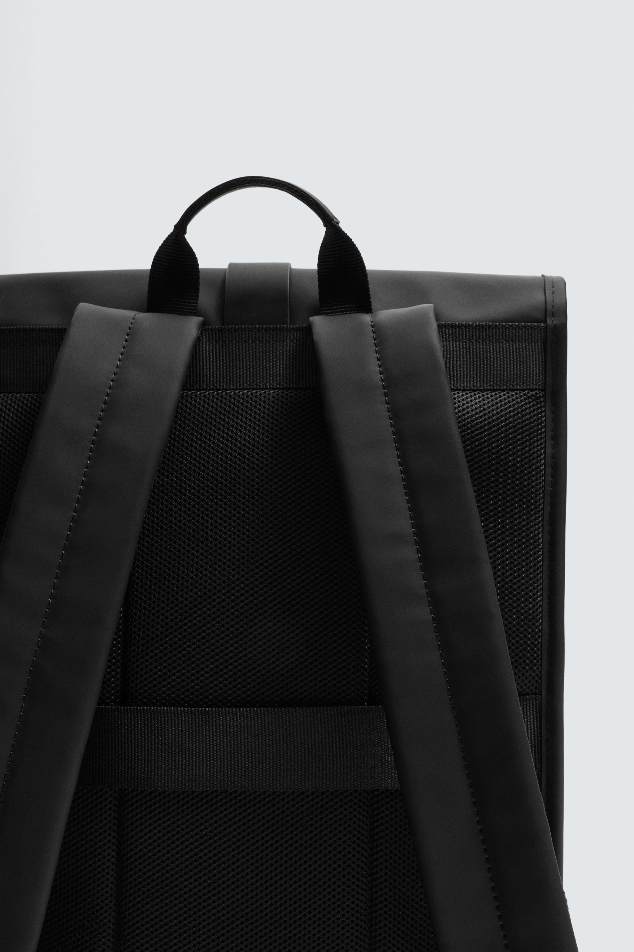 RUBBERIZED FLAP BACKPACK