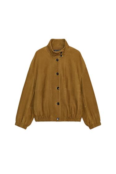 Front view of a khaki bomber jacket with a stand-up collar, button fastening, long sleeves with elasticated cuffs, and concealed pockets.