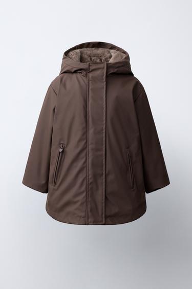 IMPERMEABILE GOMMATO WATER REPELLENT EFFETTO PELLICCIA SINTETICA - Testa di moro di Zara