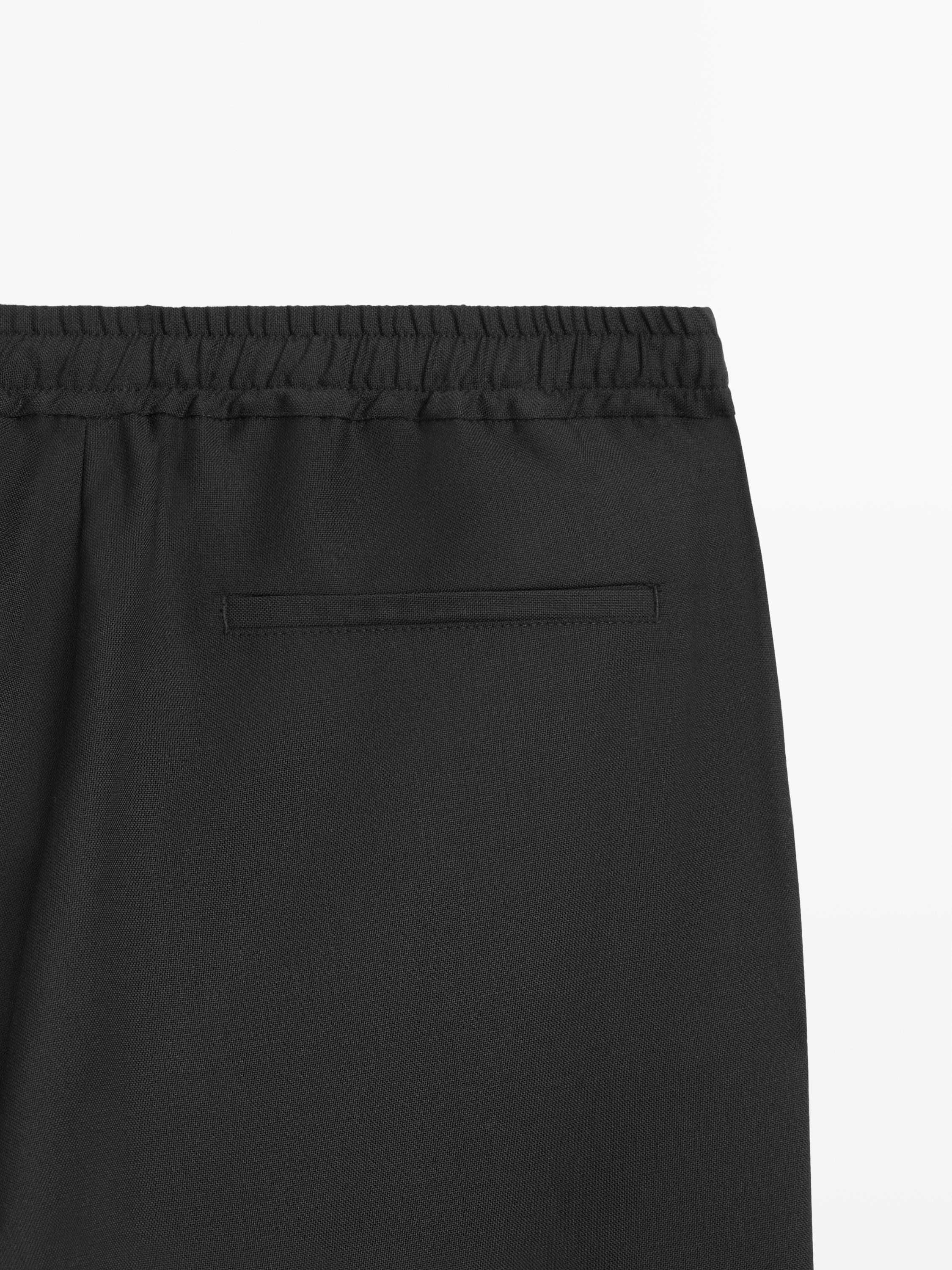 Relaxed fit wool trousers
