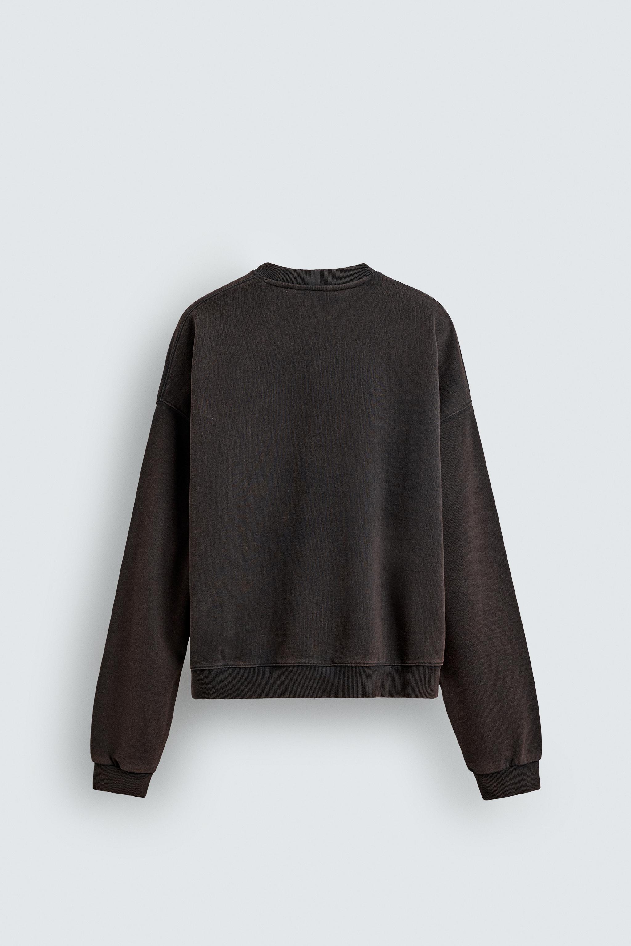 WASHED SWEATSHIRT WITH PRINTED TEXT